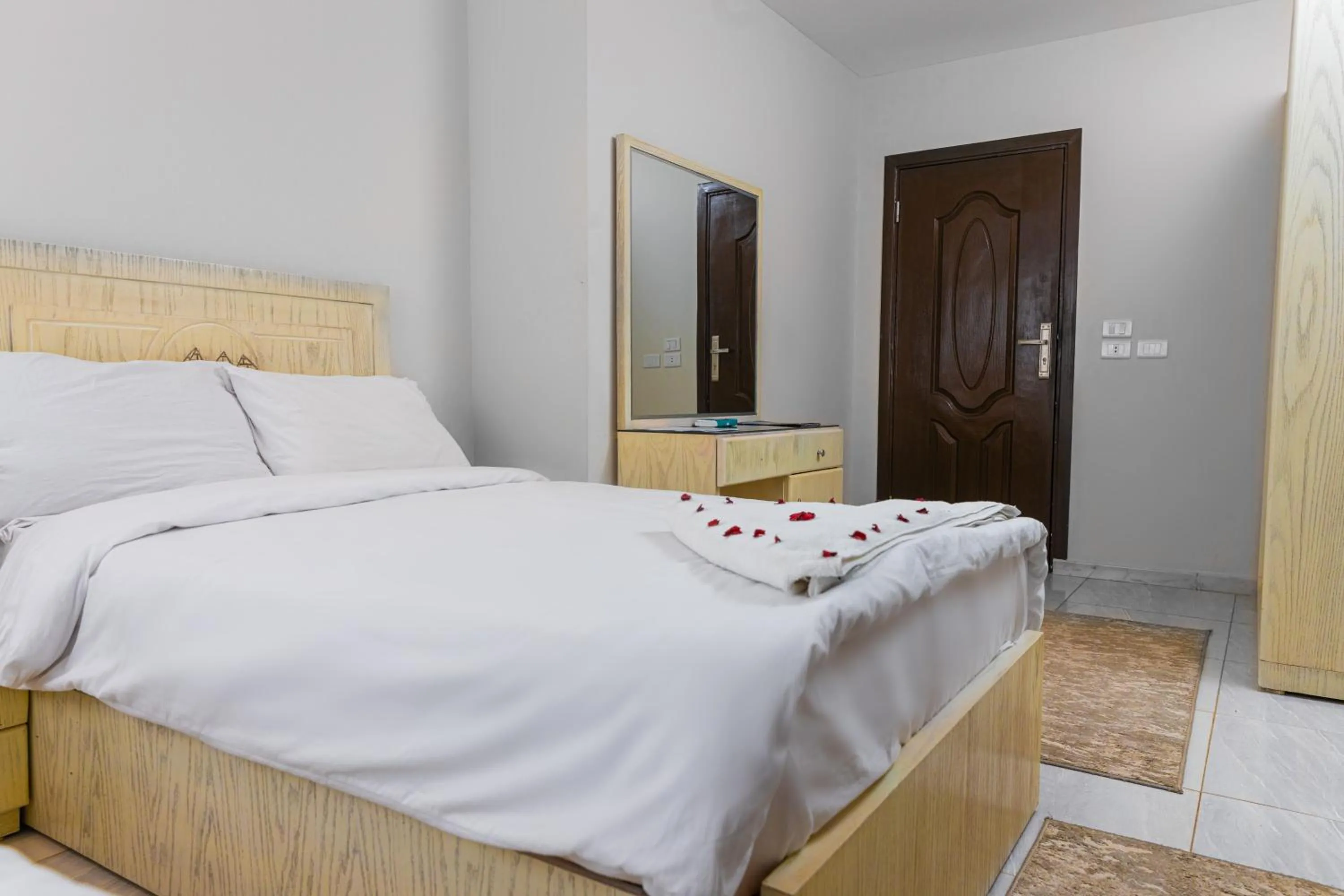 Bed in Pyramids Land Hotel