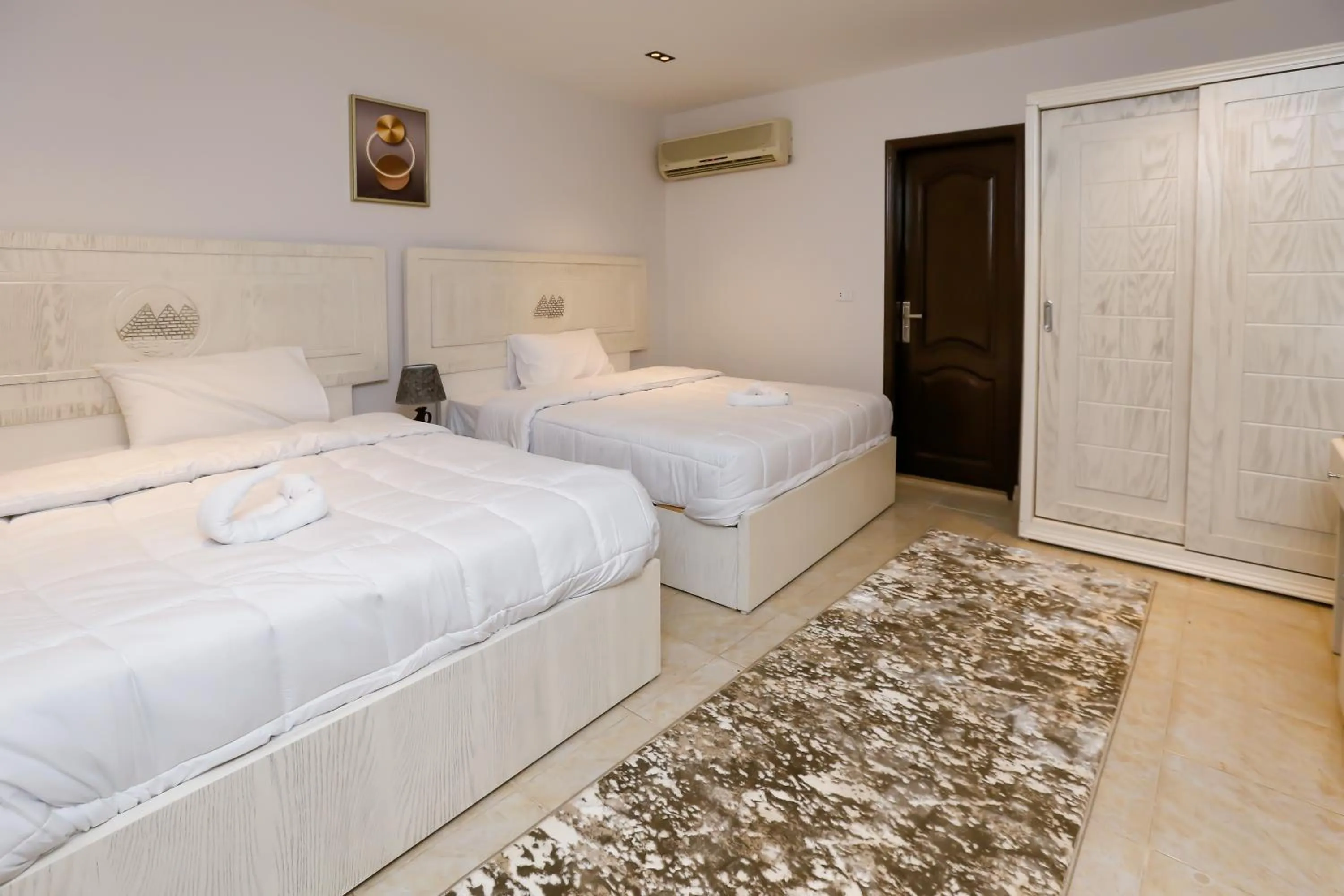 Bed in Pyramids Land Hotel