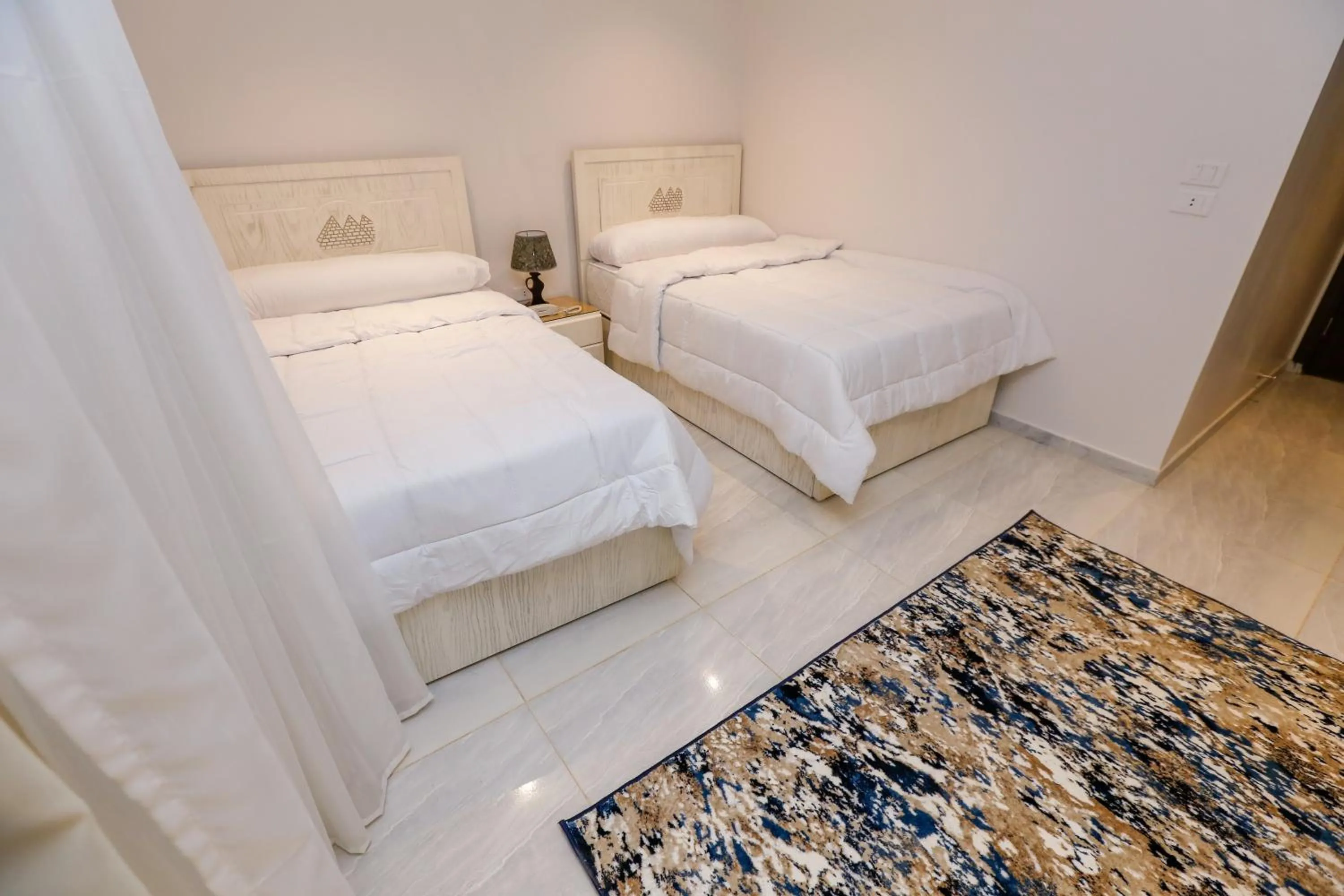 Bed in Pyramids Land Hotel