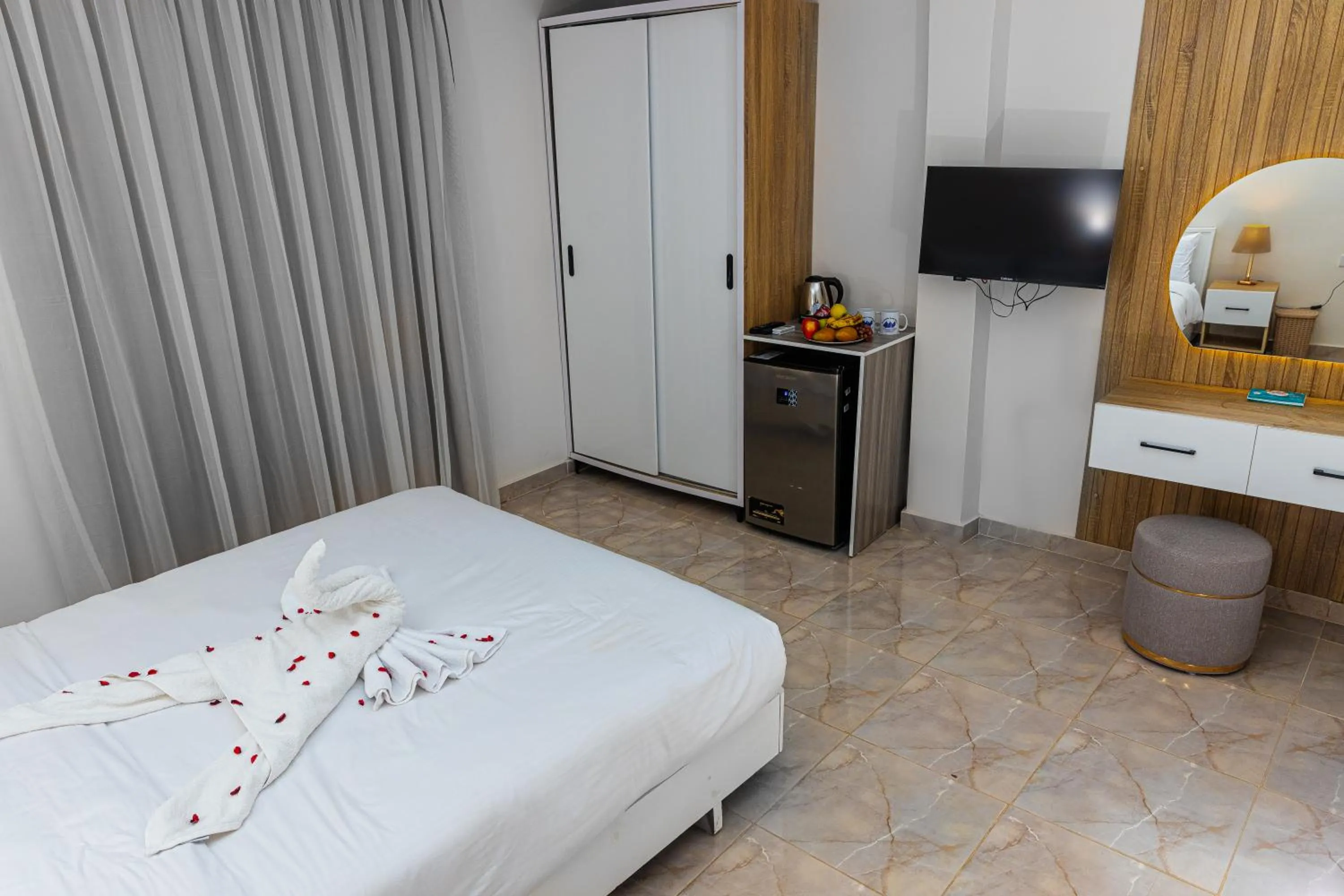 Bed in Pyramids Land Hotel