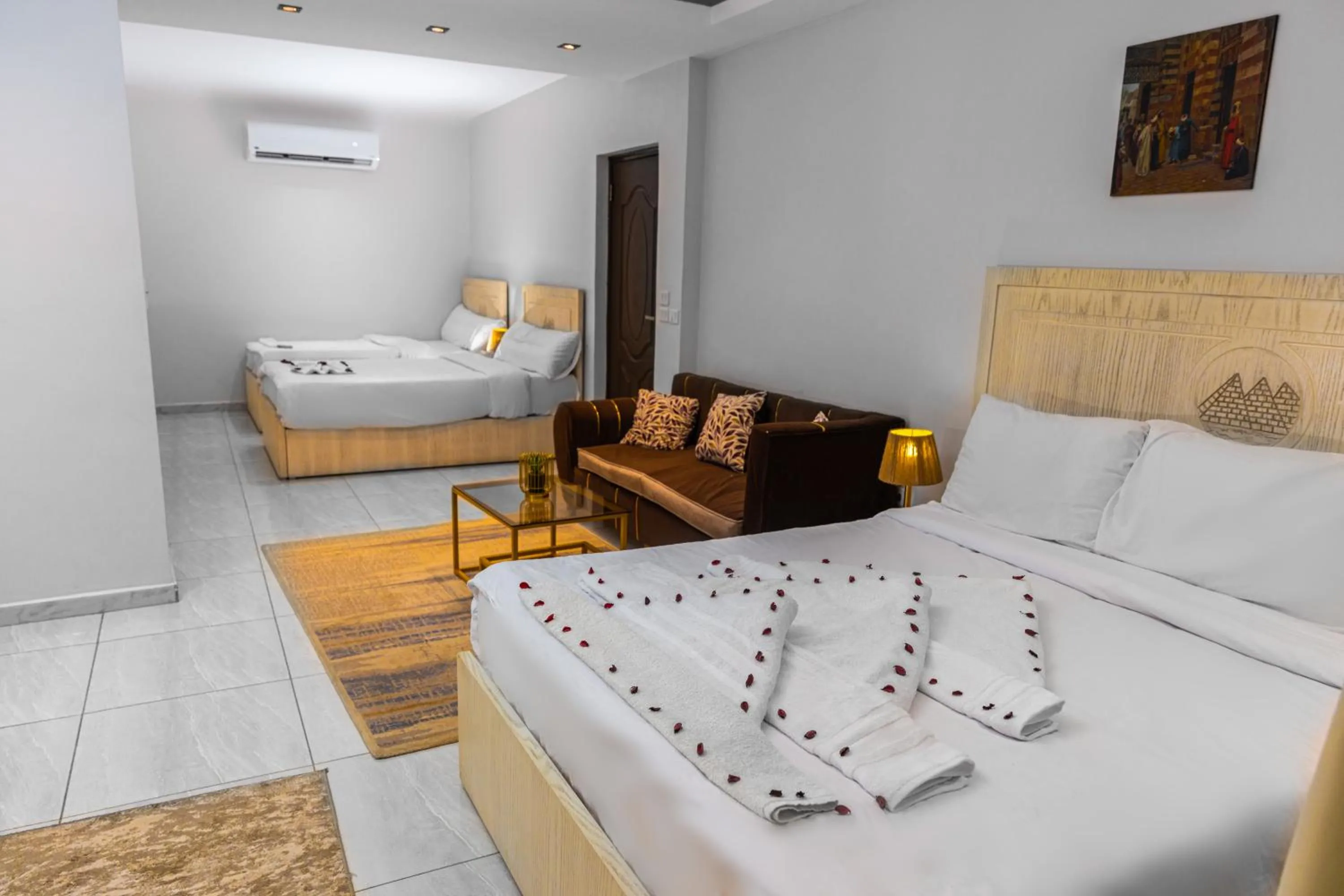 Bed in Pyramids Land Hotel