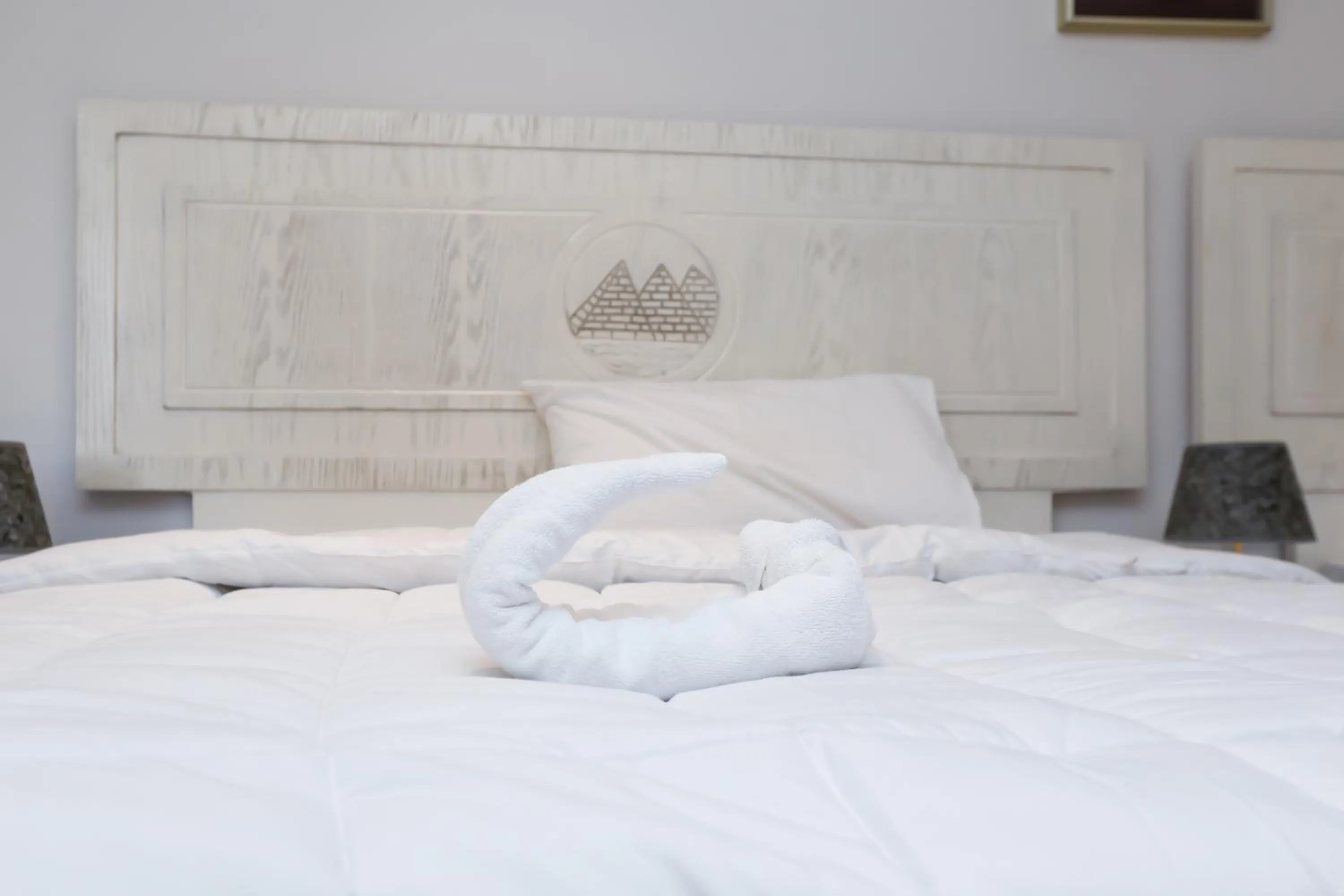 Bed in Pyramids Land Hotel