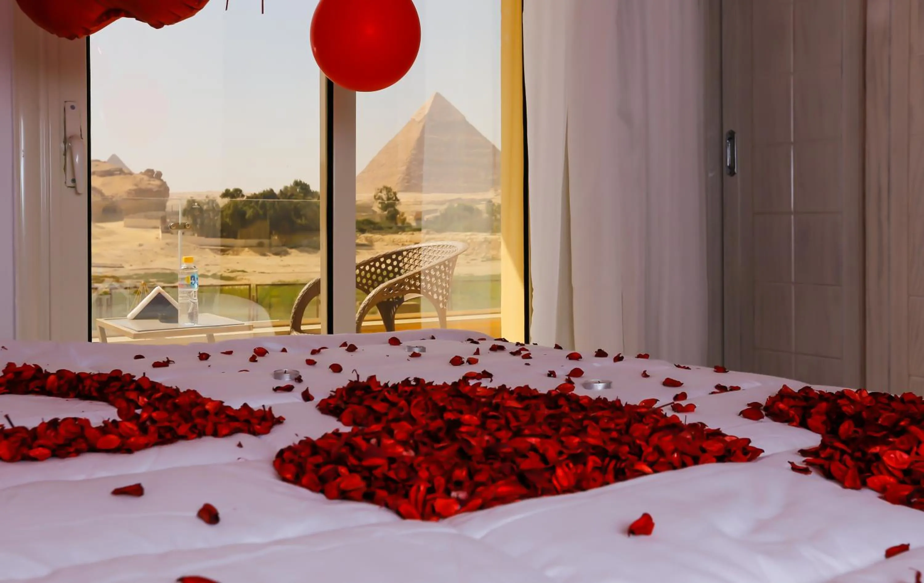 Bed in Pyramids Land Hotel
