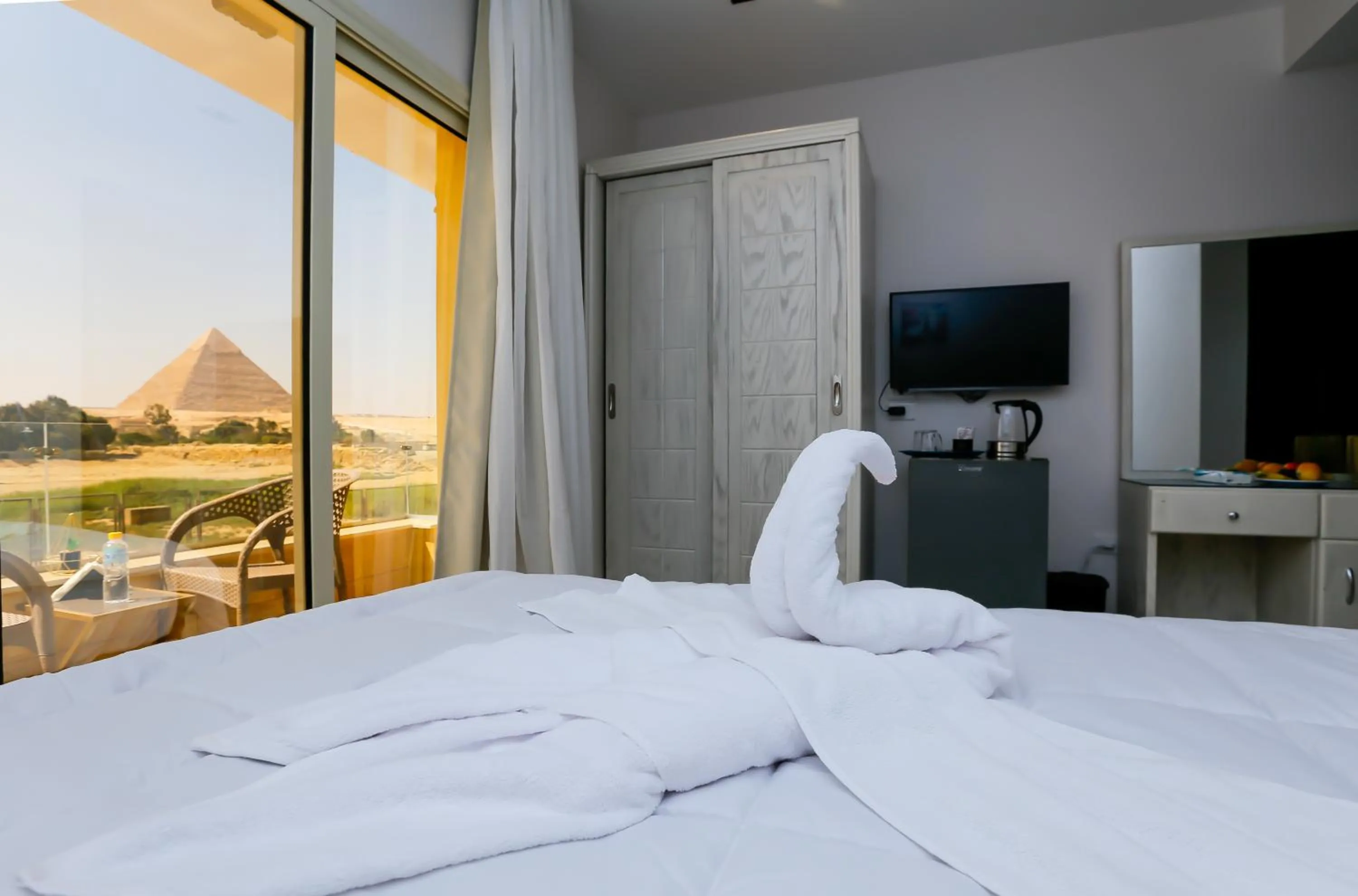 Bed in Pyramids Land Hotel