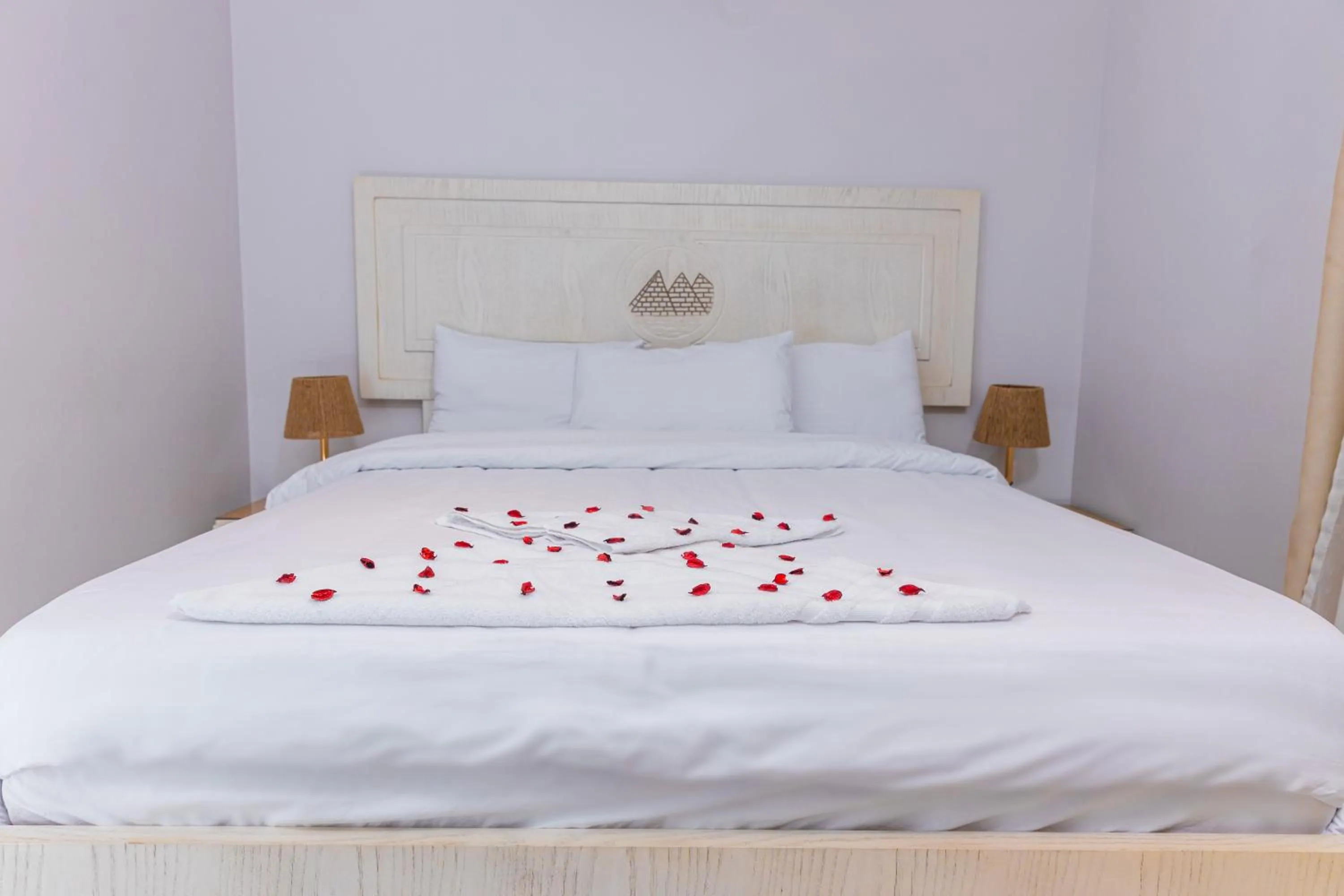 Bed in Pyramids Land Hotel