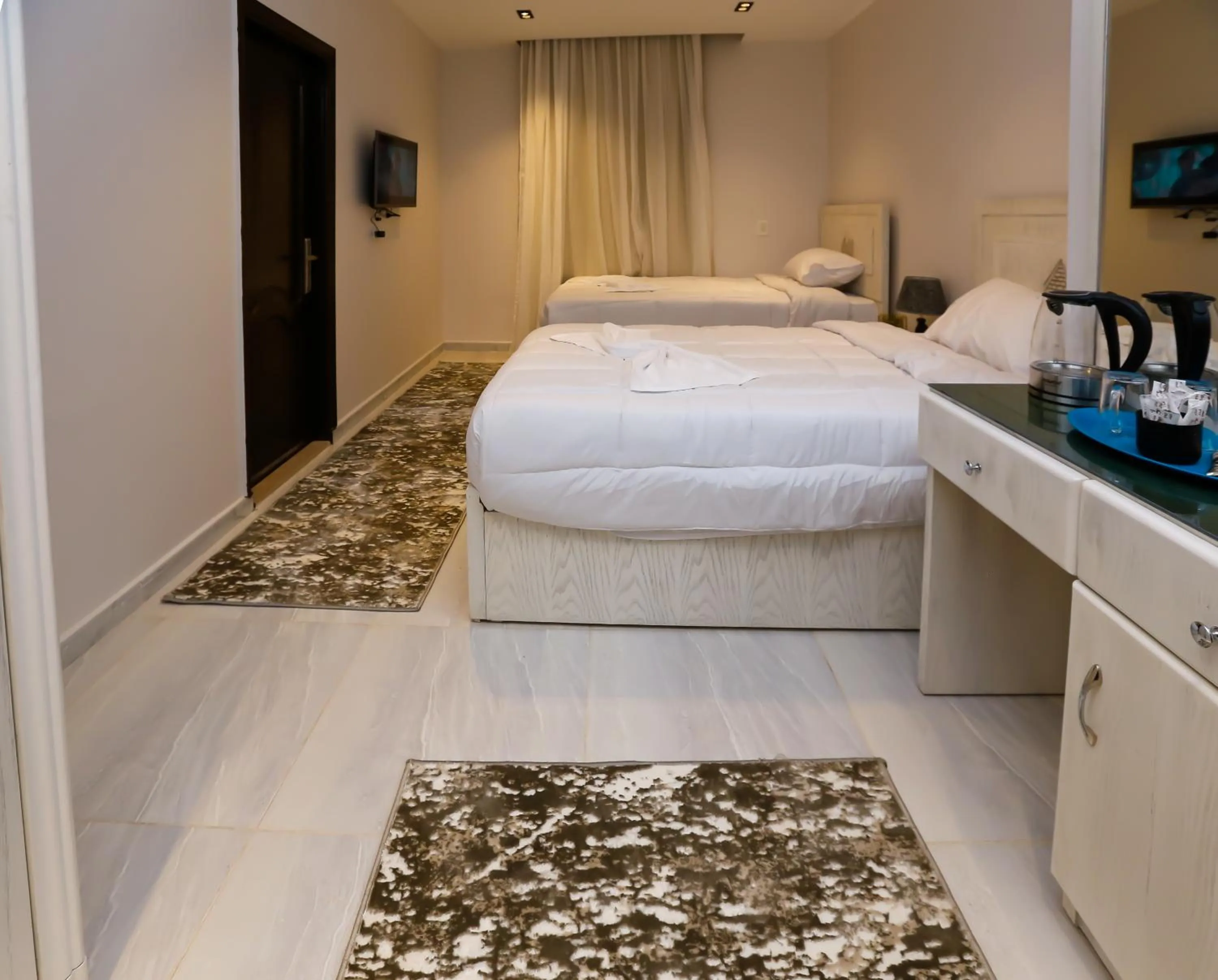 Bed in Pyramids Land Hotel