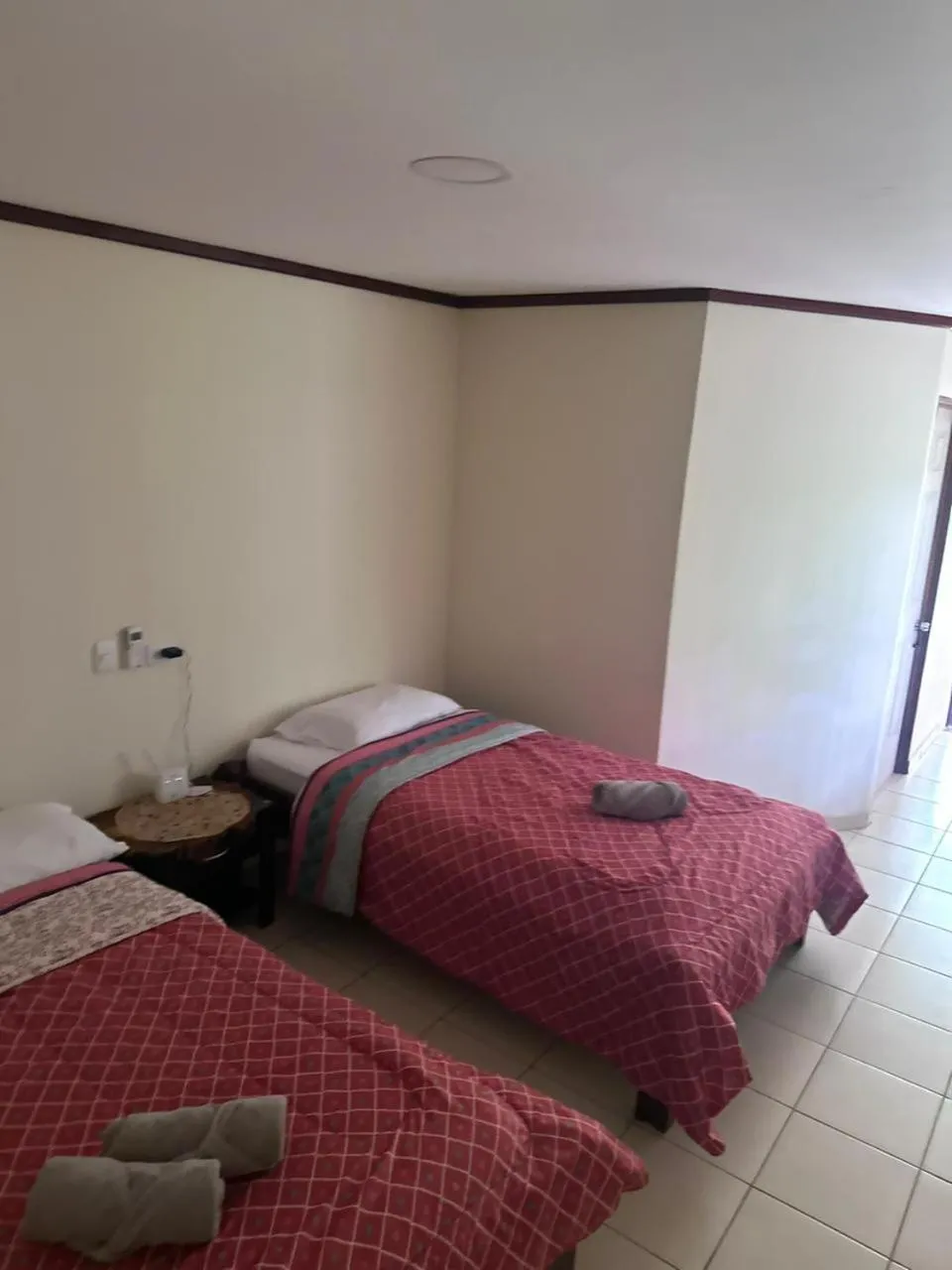 Bed in RIVER SIDE LODGE