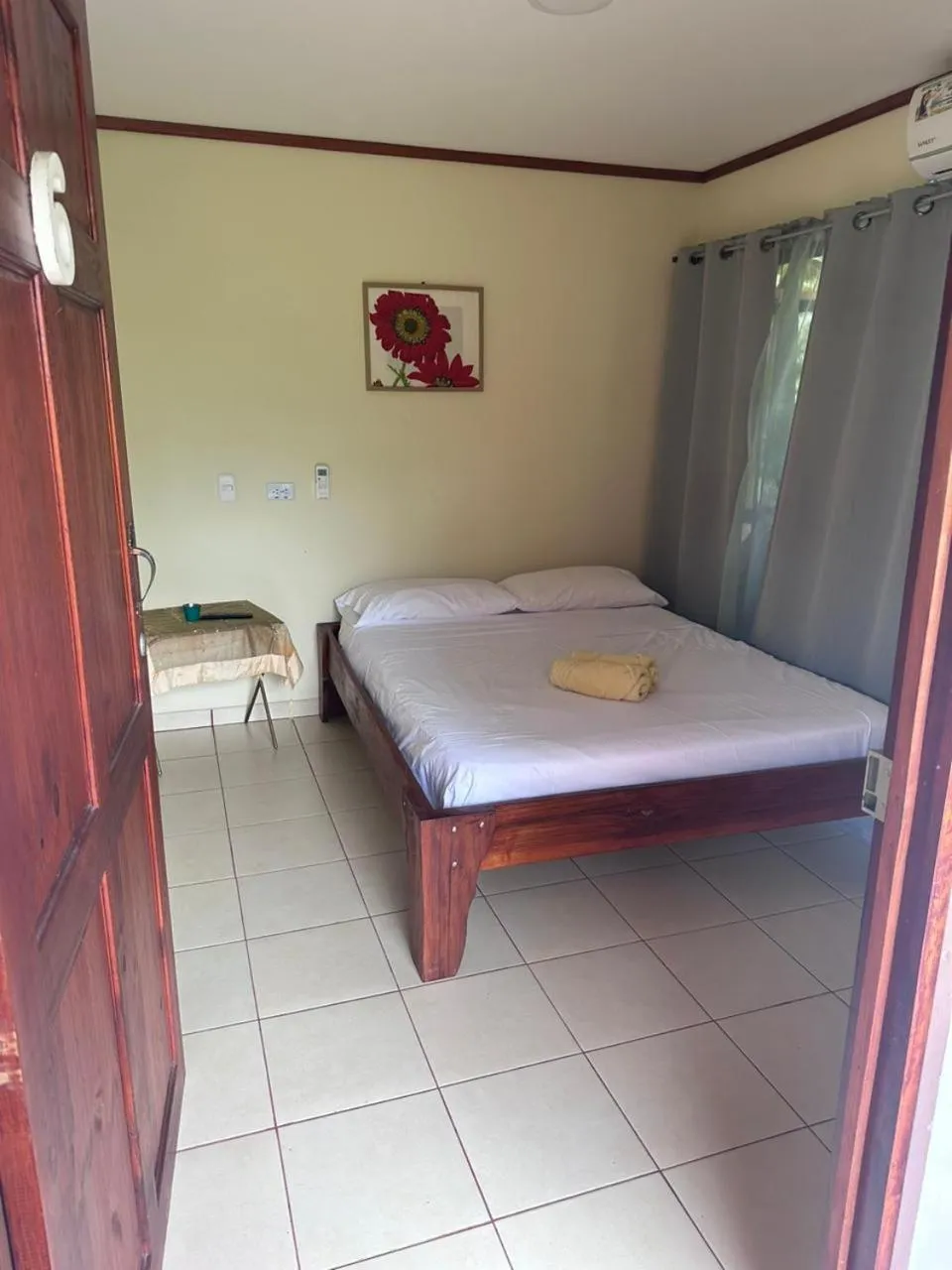 Bed in RIVER SIDE LODGE