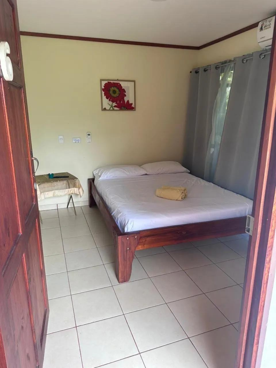 Bed in RIVER SIDE LODGE