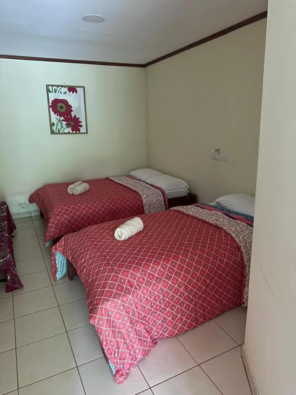 Bed in RIVER SIDE LODGE