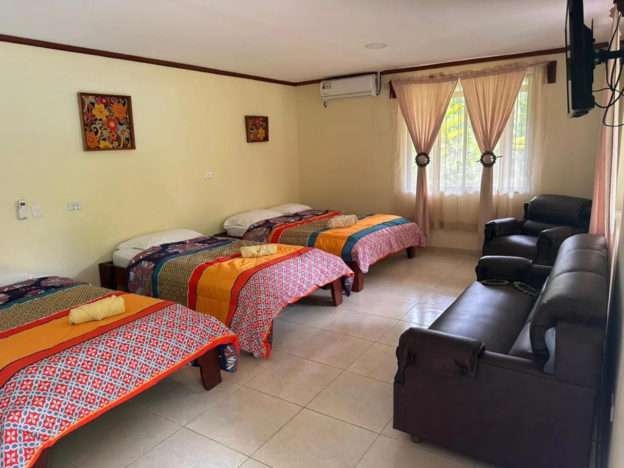 Bed in RIVER SIDE LODGE