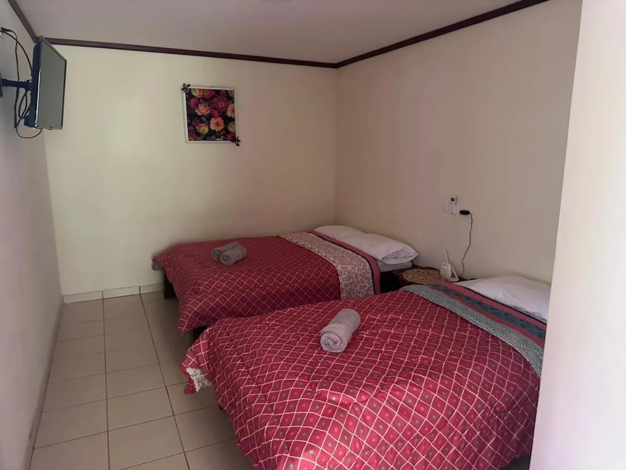 Bed in RIVER SIDE LODGE