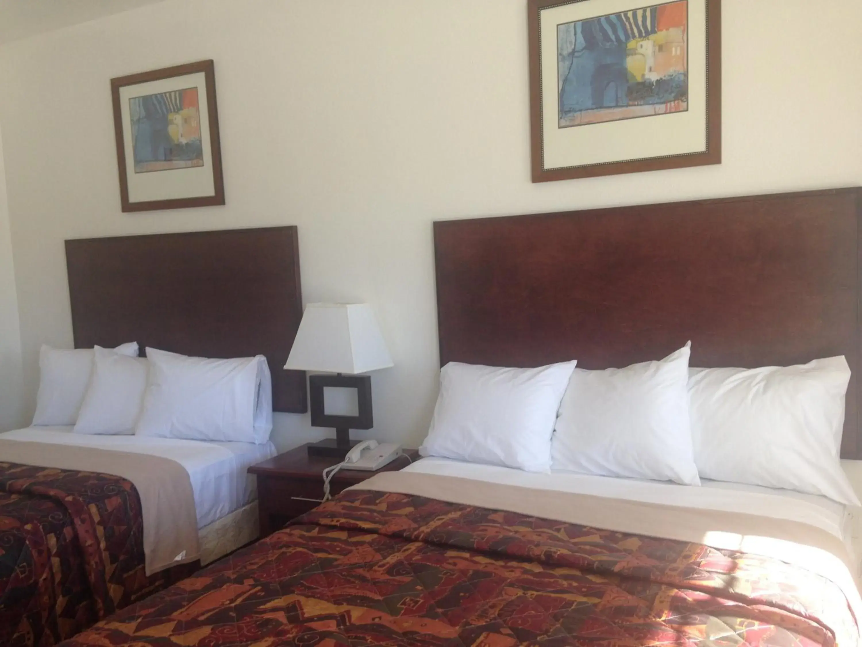 Photo of the whole room, Bed in America Inn & Suites Photo of the whole room, Bed in America Inn & Suites