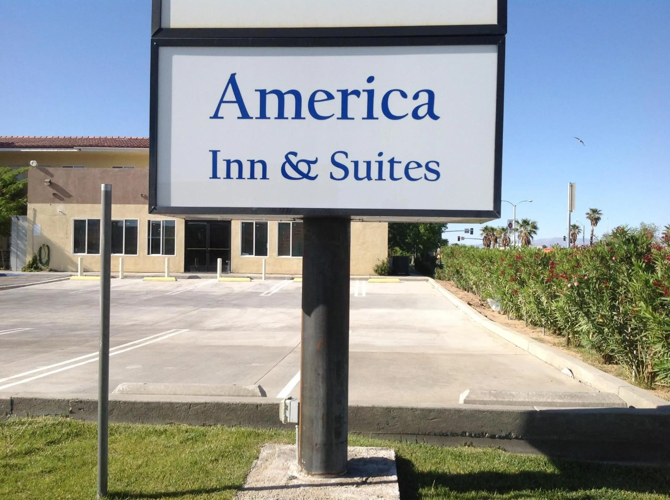 Property logo or sign in America Inn & Suites