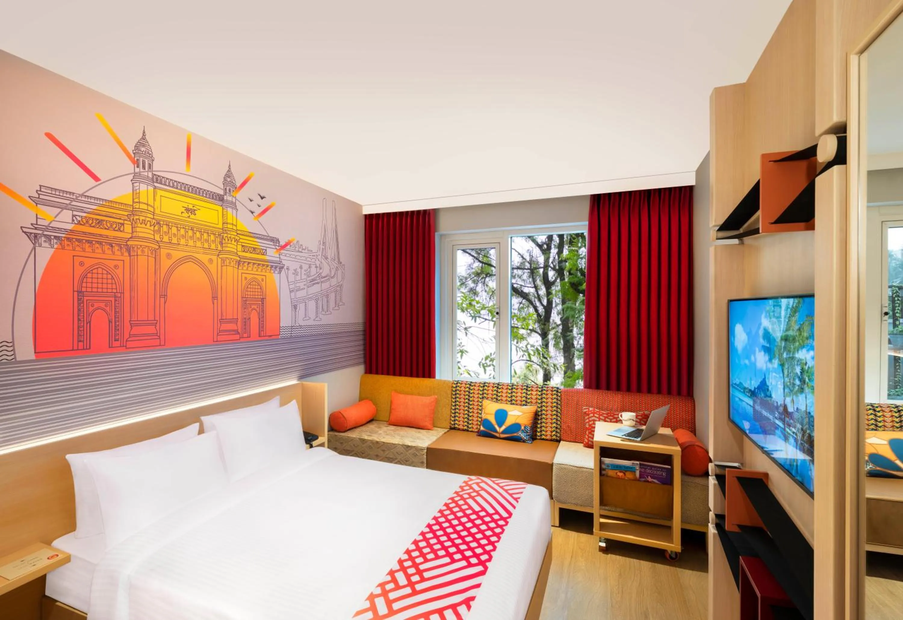 Living room, Bed in Ginger Mumbai Airport