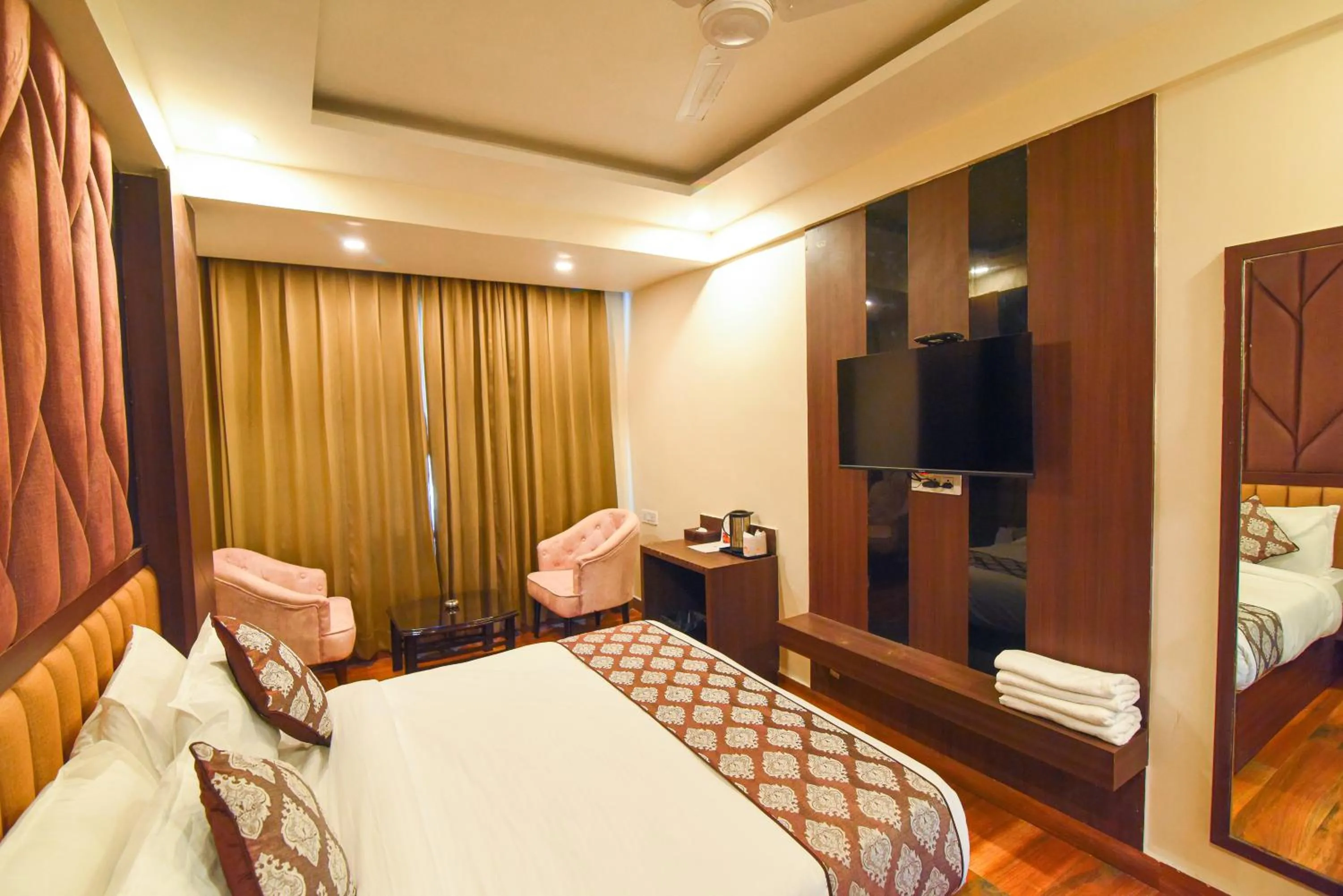 Photo of the whole room, Bed in Hotel Swagat Suites