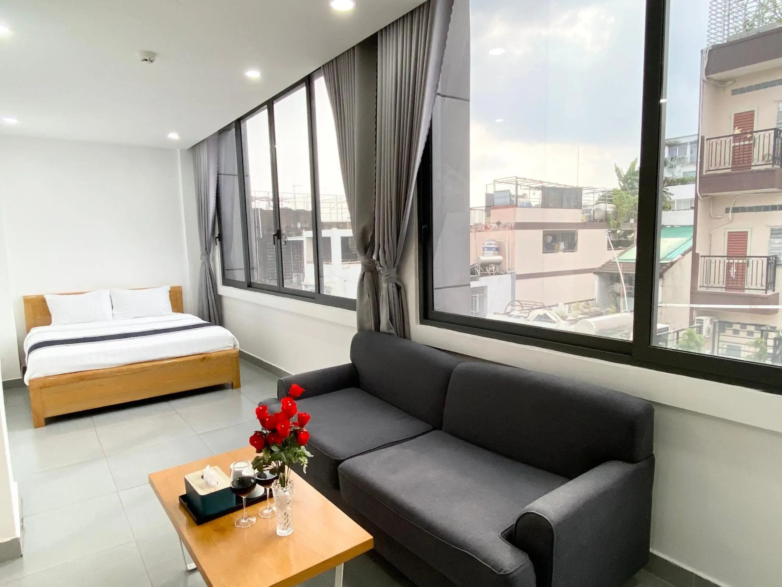 Seating area, Bed in Home Away Minh Khai - Serviced Apartment
