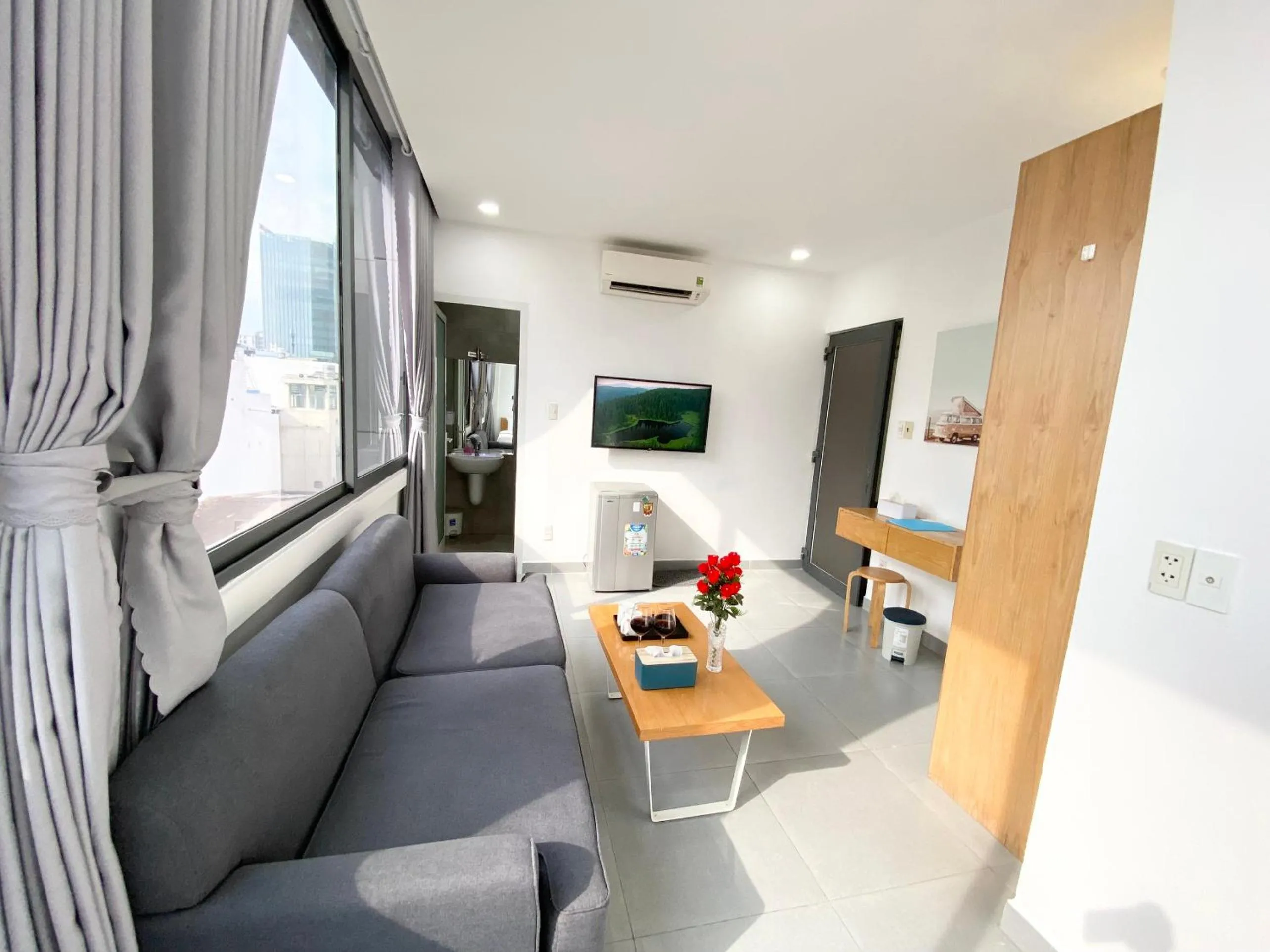 TV and multimedia in Home Away Minh Khai - Serviced Apartment