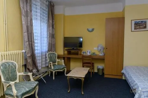 Bed in Hôtel de la cloche