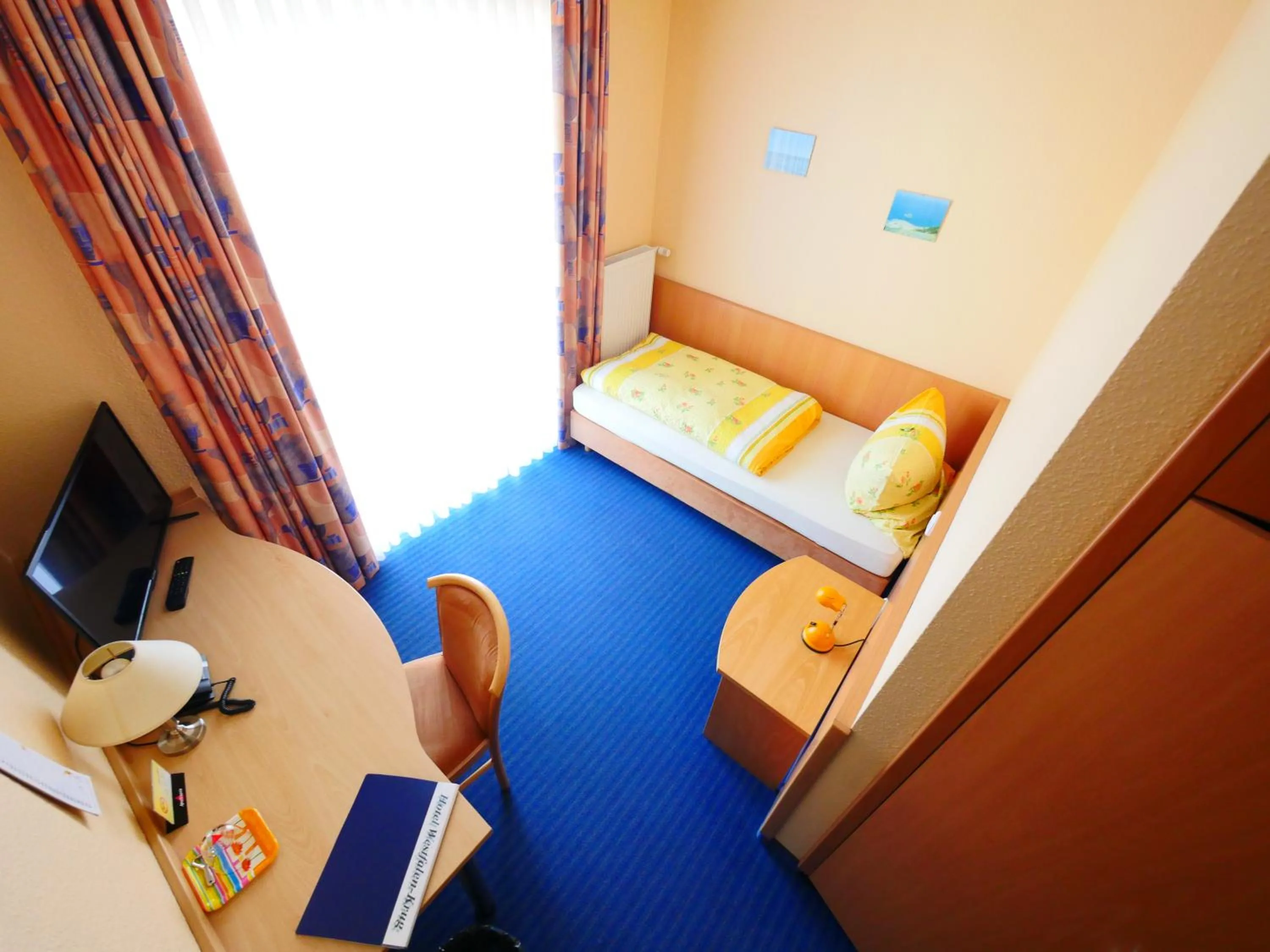 Photo of the whole room, Bed in TM Hotel Westfalen