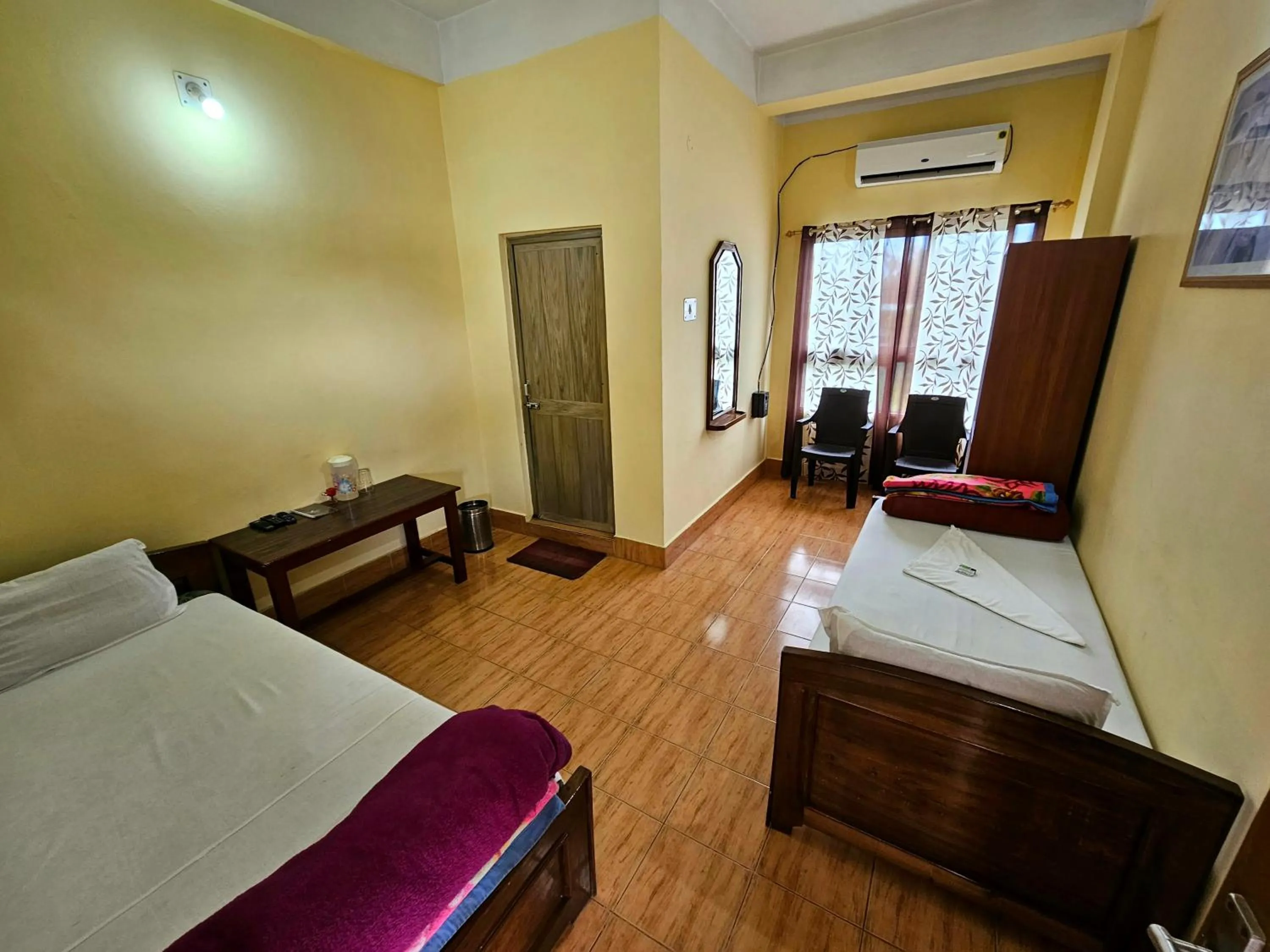 Bed in Hotel Rishiraj