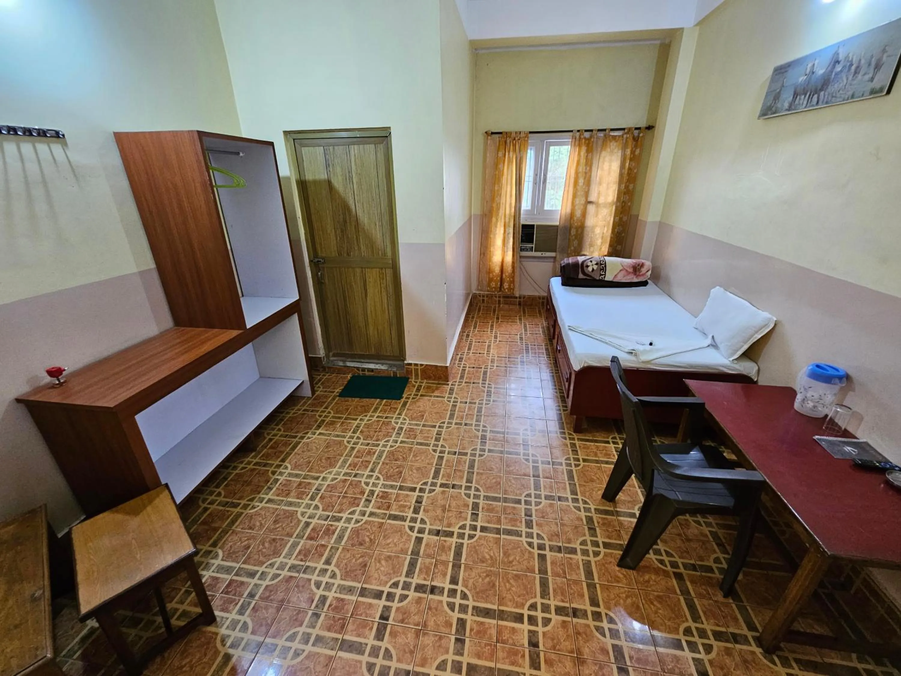 Bed in Hotel Rishiraj