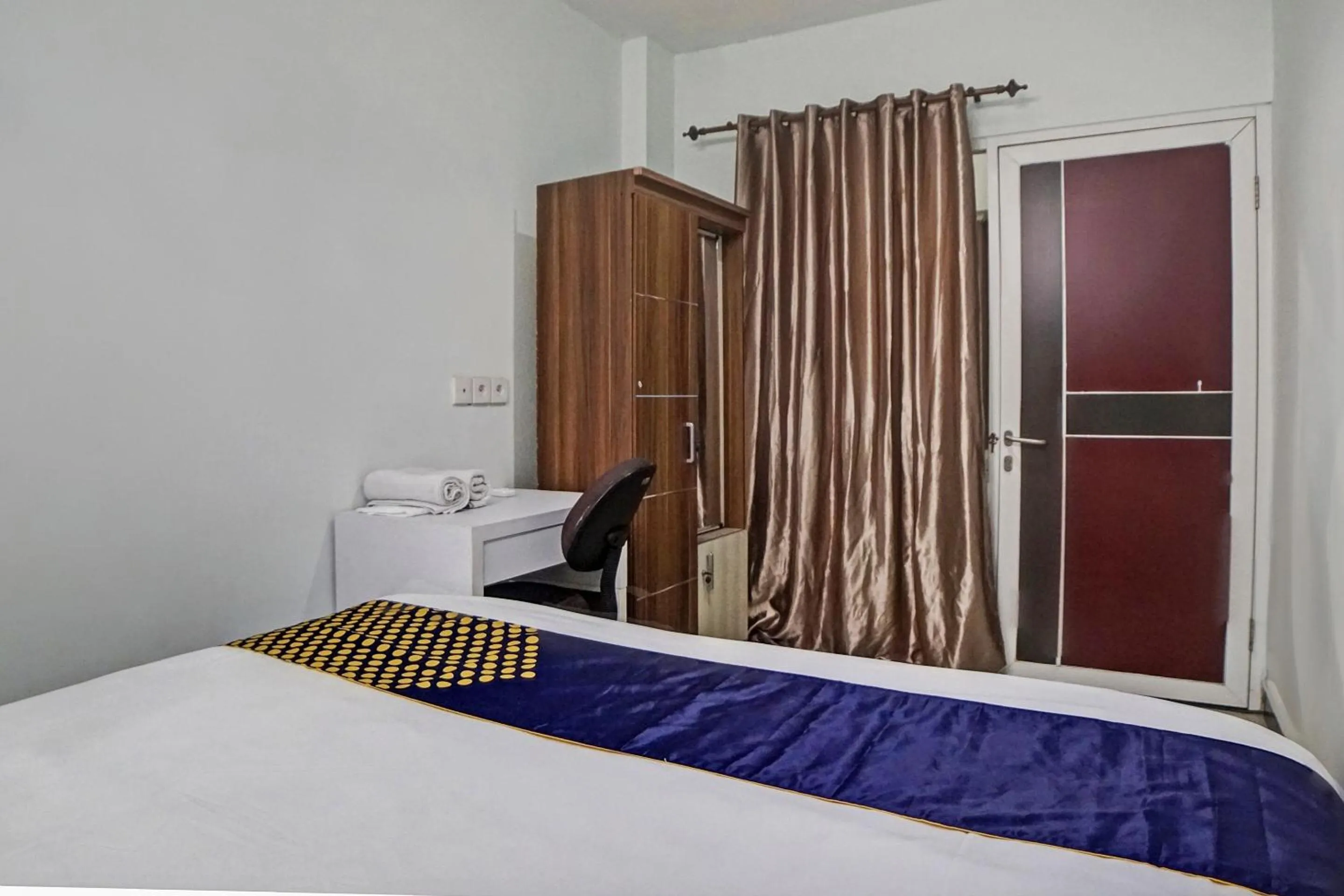 Bedroom in Hotel O Finest House Near Amplas Bus Terminal