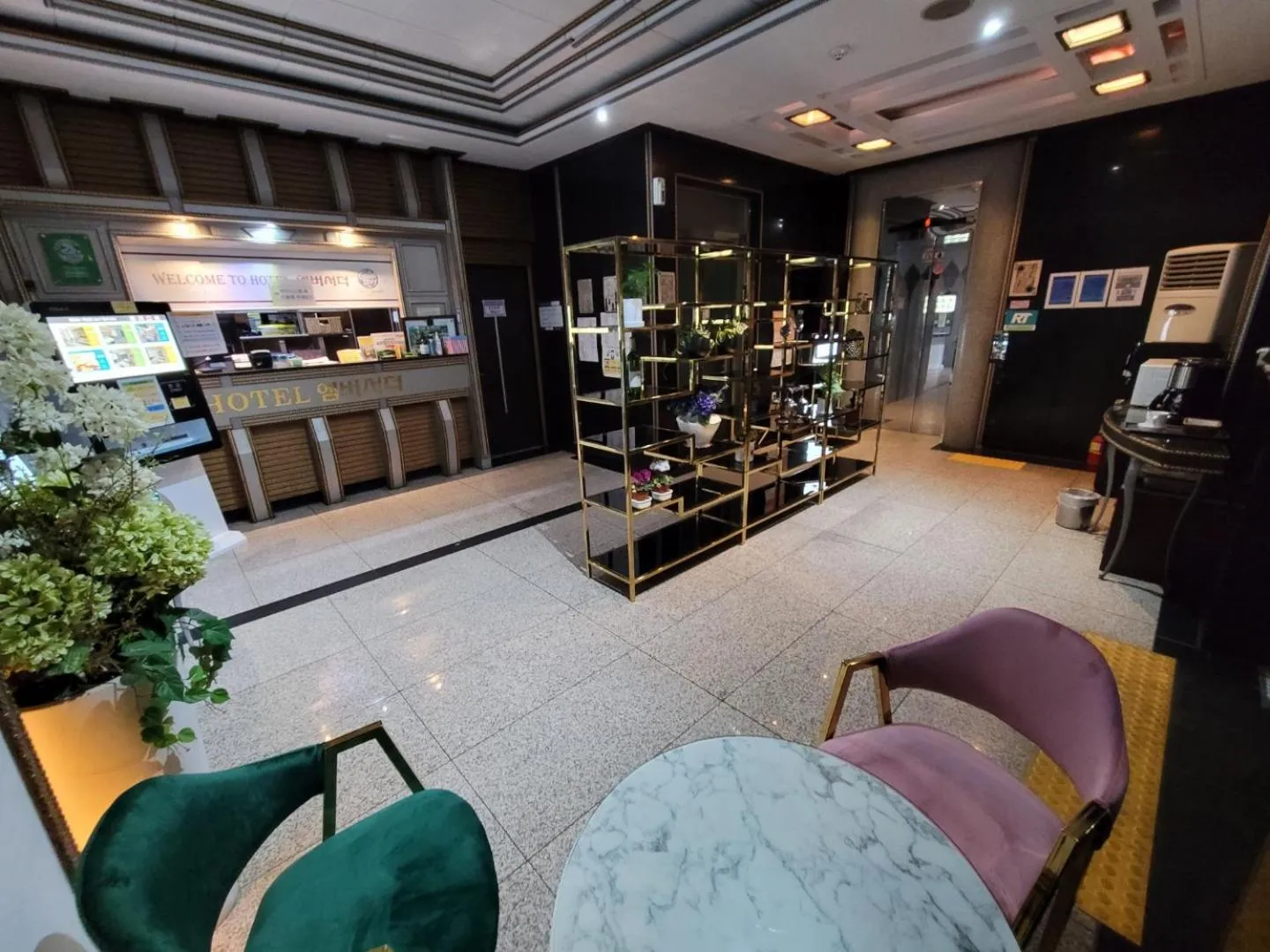 Lobby or reception in Ambassador Hotel