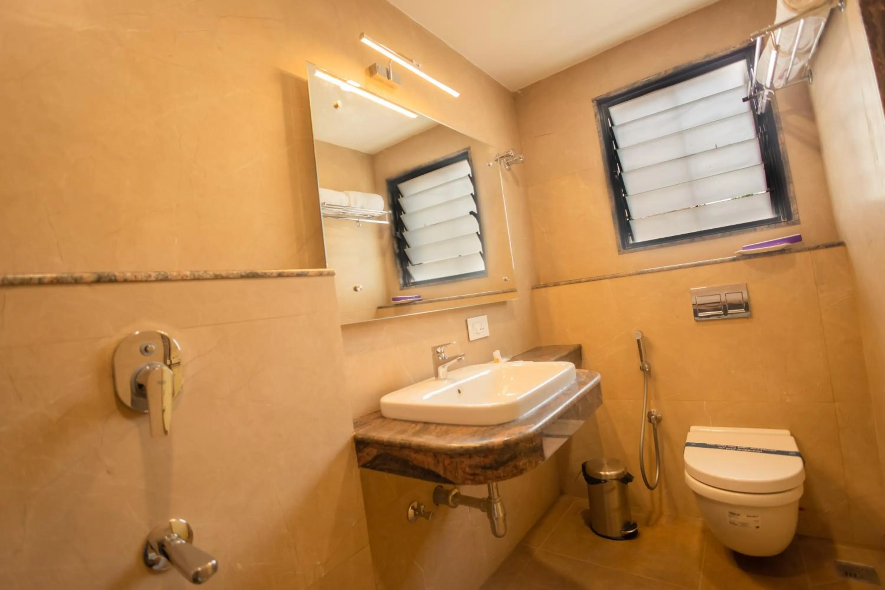 Toilet in Hotel Grand Sabarees