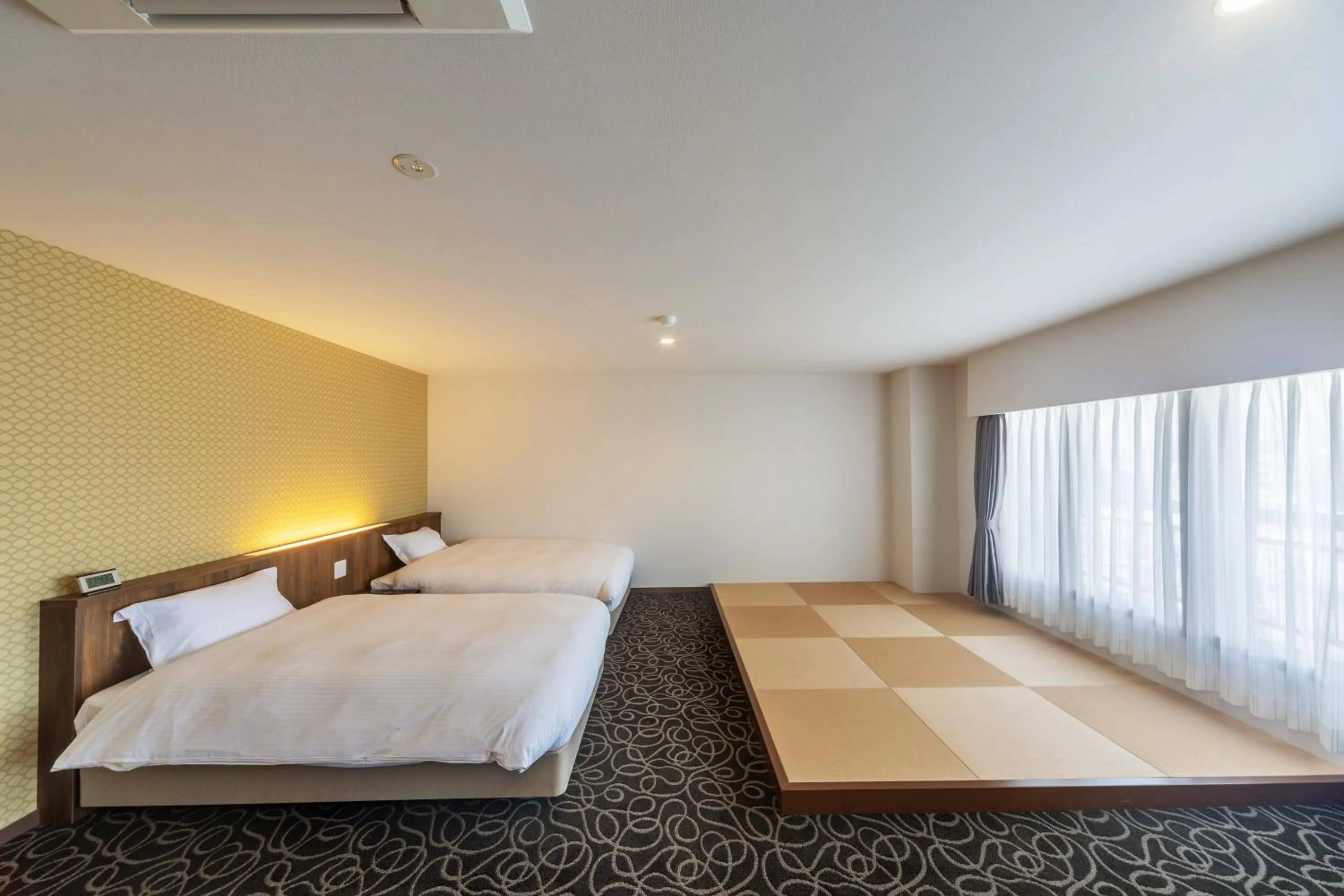 Bed in Suikouen Hotel