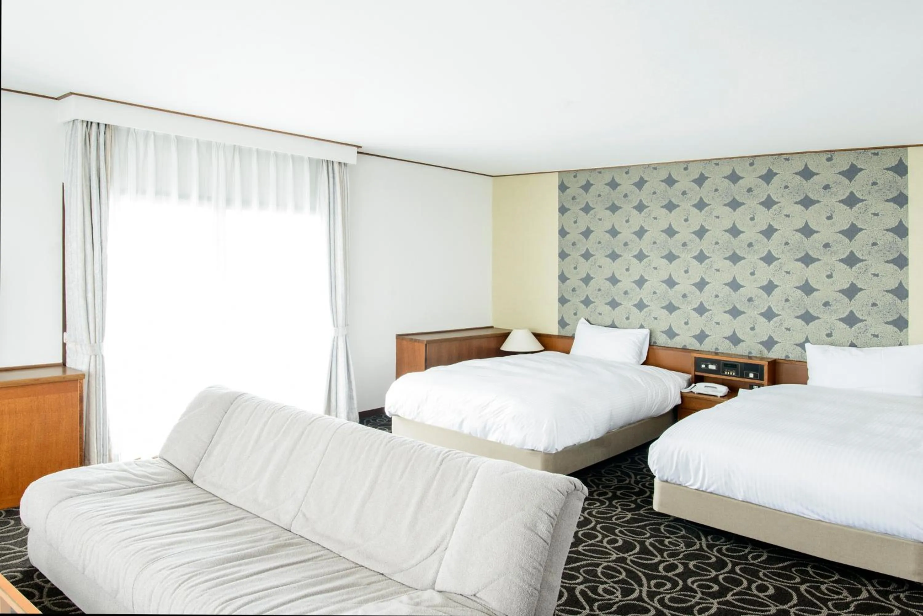 Bed in Suikouen Hotel