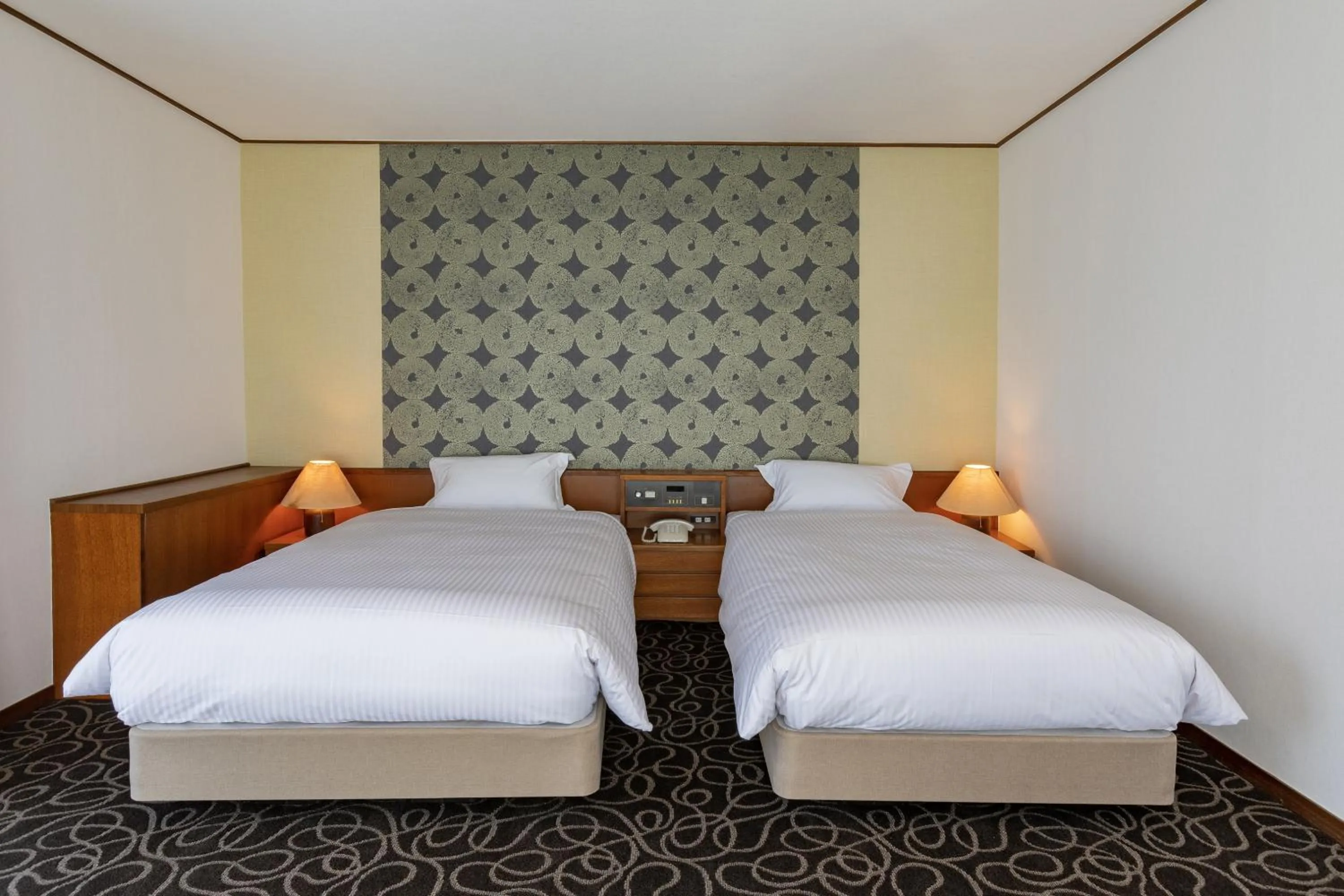 Bed in Suikouen Hotel