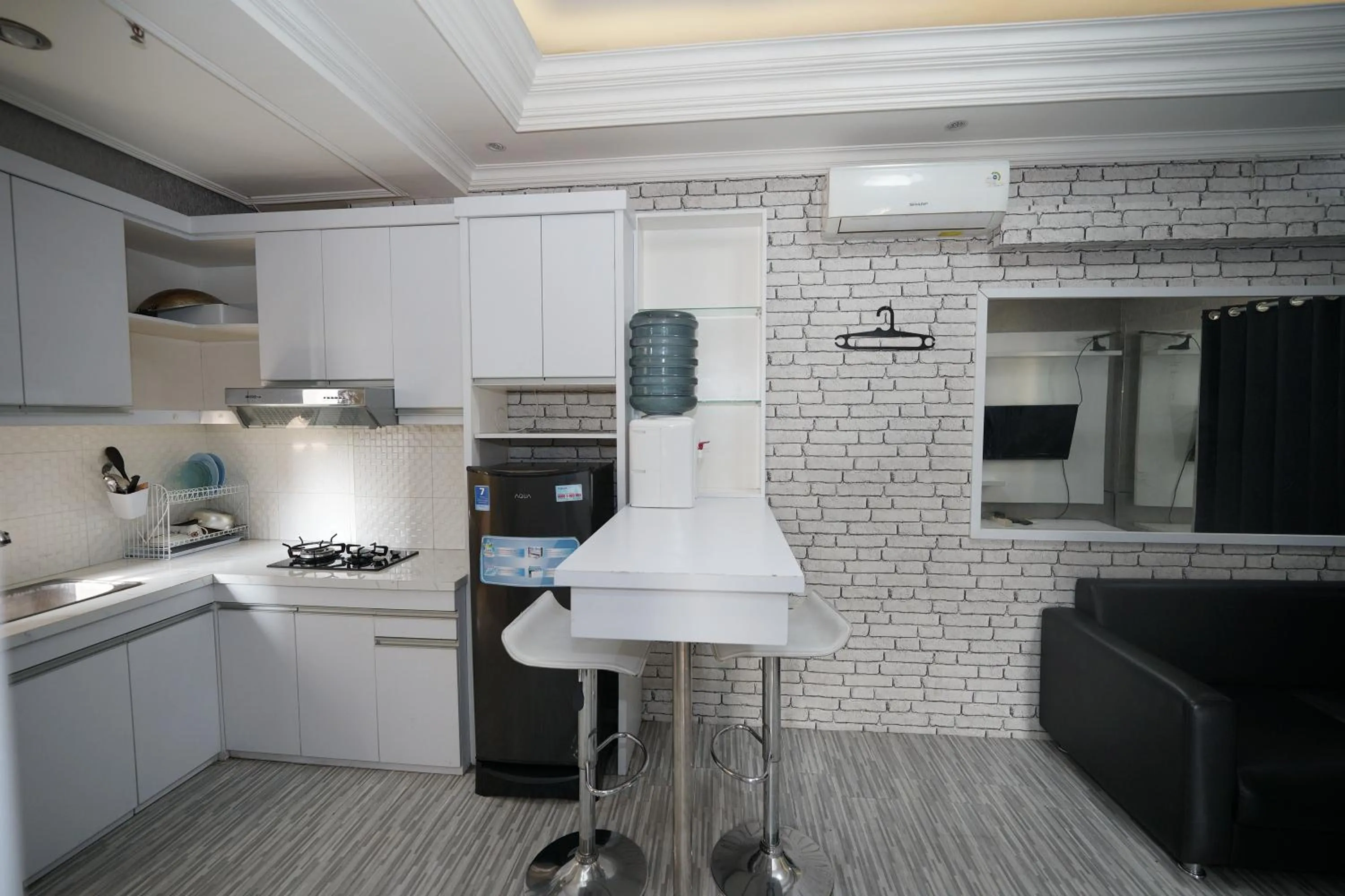 Kitchen or kitchenette in Perfect Stay Apartement The Suites Metro Bandung By Sultan Property