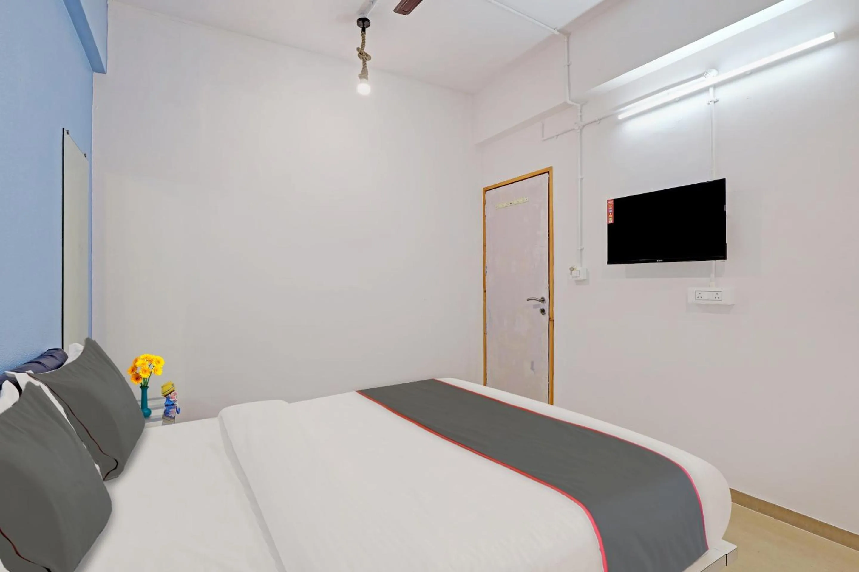 Communal lounge/ TV room, Bed in Hotel Solitaire, Best Luxurious Hotel AC Rooms In Surat