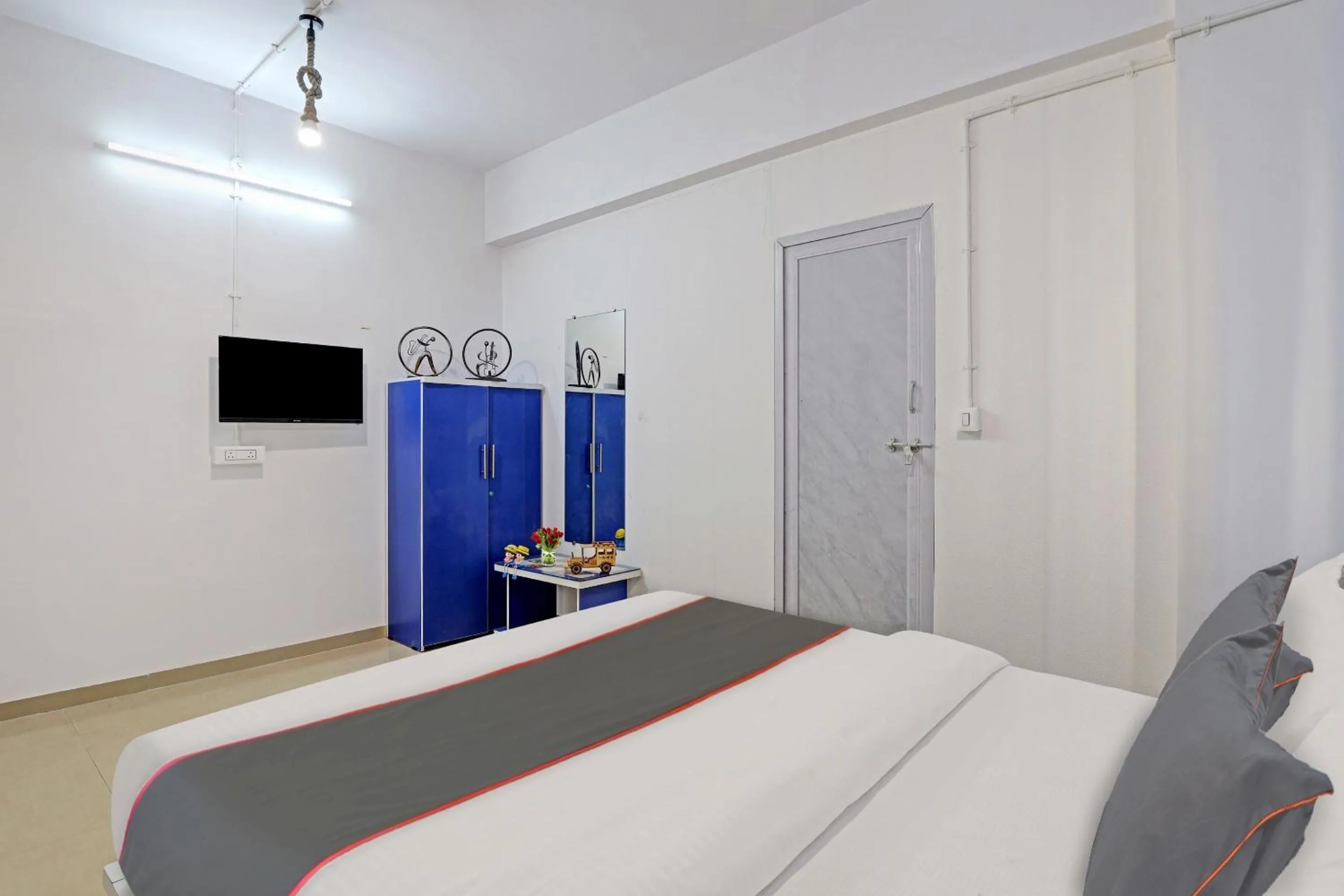 Toilet, Bed in Hotel Solitaire, Best Luxurious Hotel AC Rooms In Surat