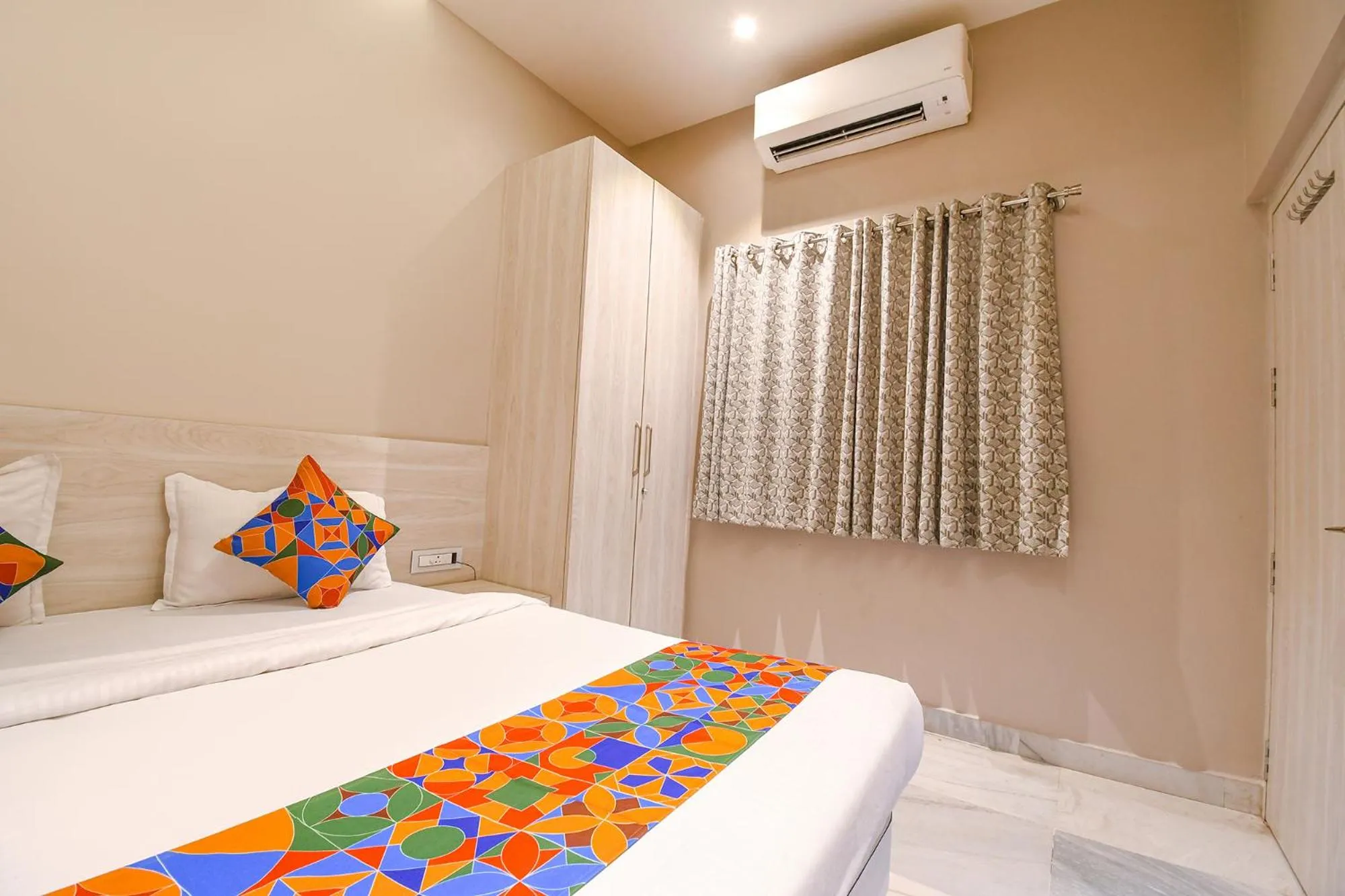 Bed in FabHotel Kitchen Q Inn - Belaghata