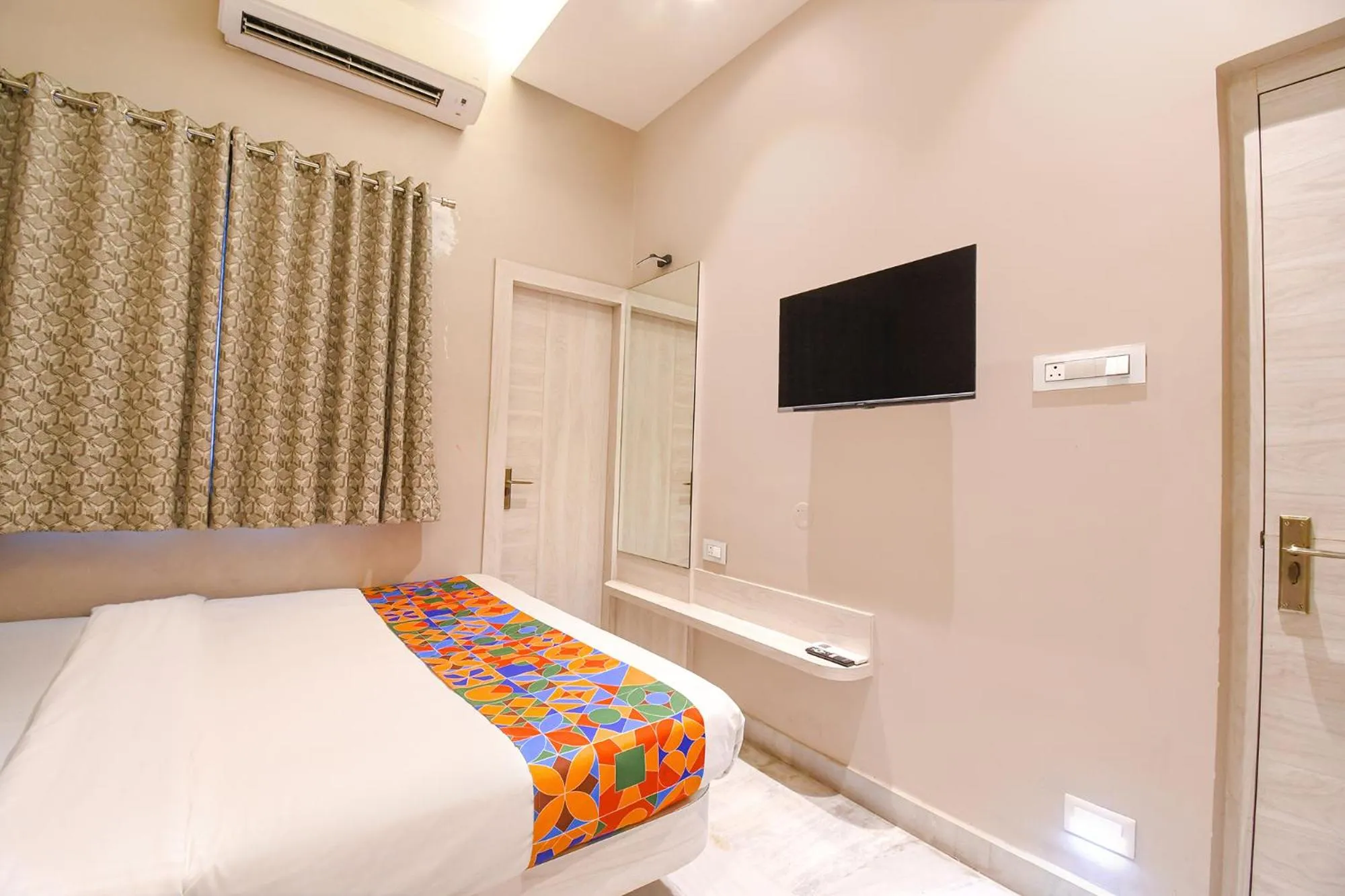 Bed in FabHotel Kitchen Q Inn - Belaghata