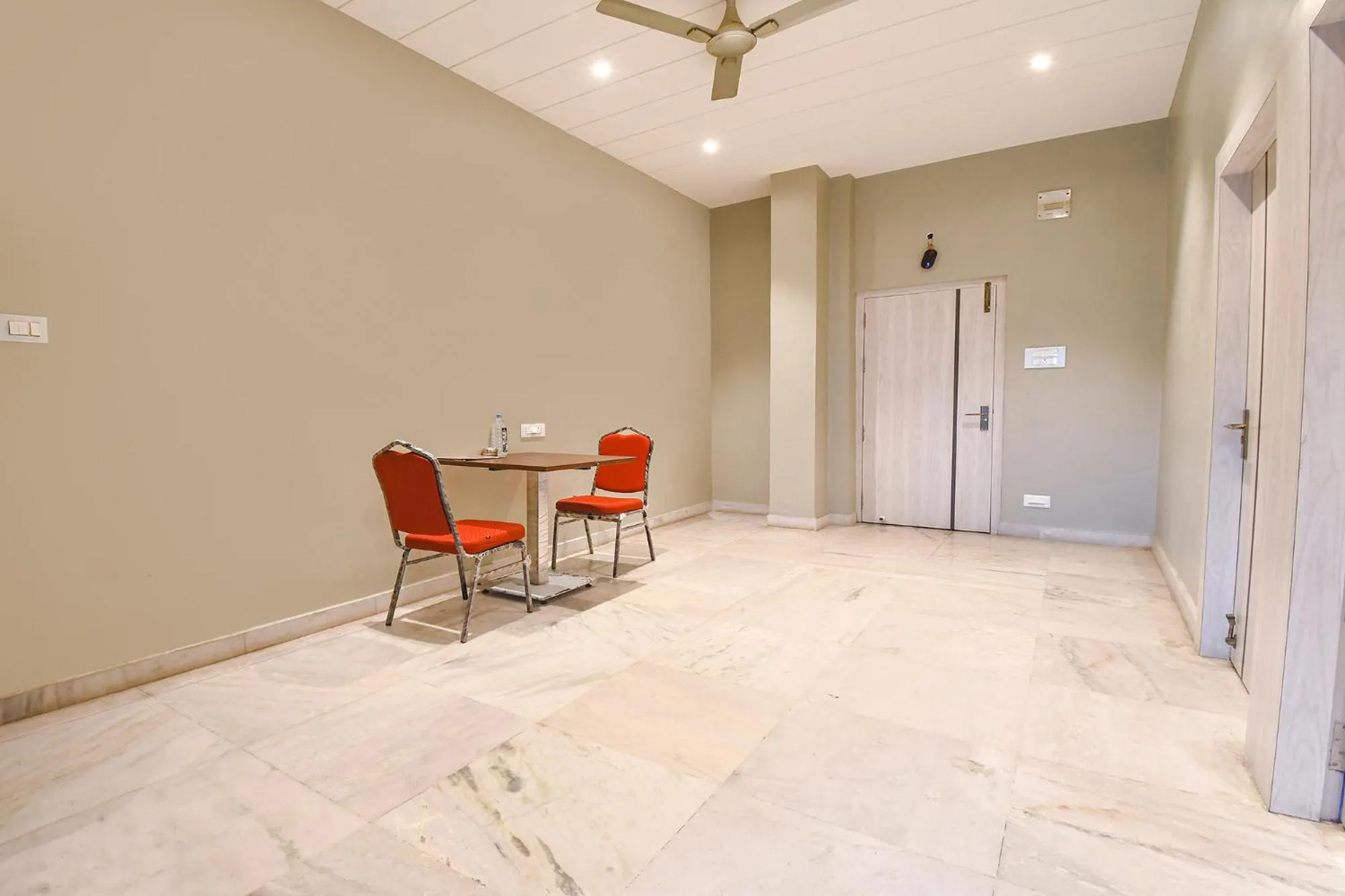 Seating area in FabHotel Kitchen Q Inn - Belaghata