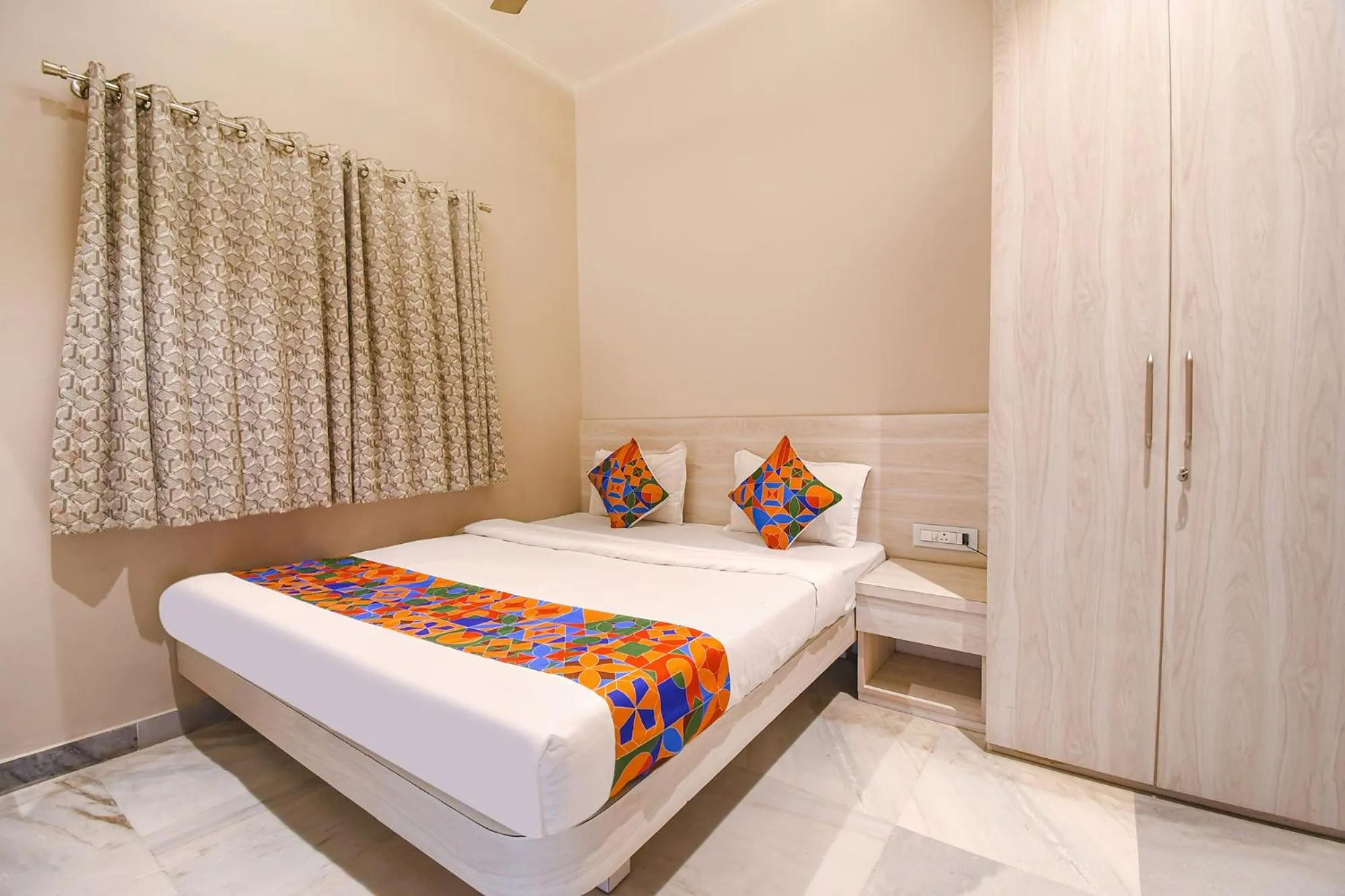 Bed in FabHotel Kitchen Q Inn - Belaghata