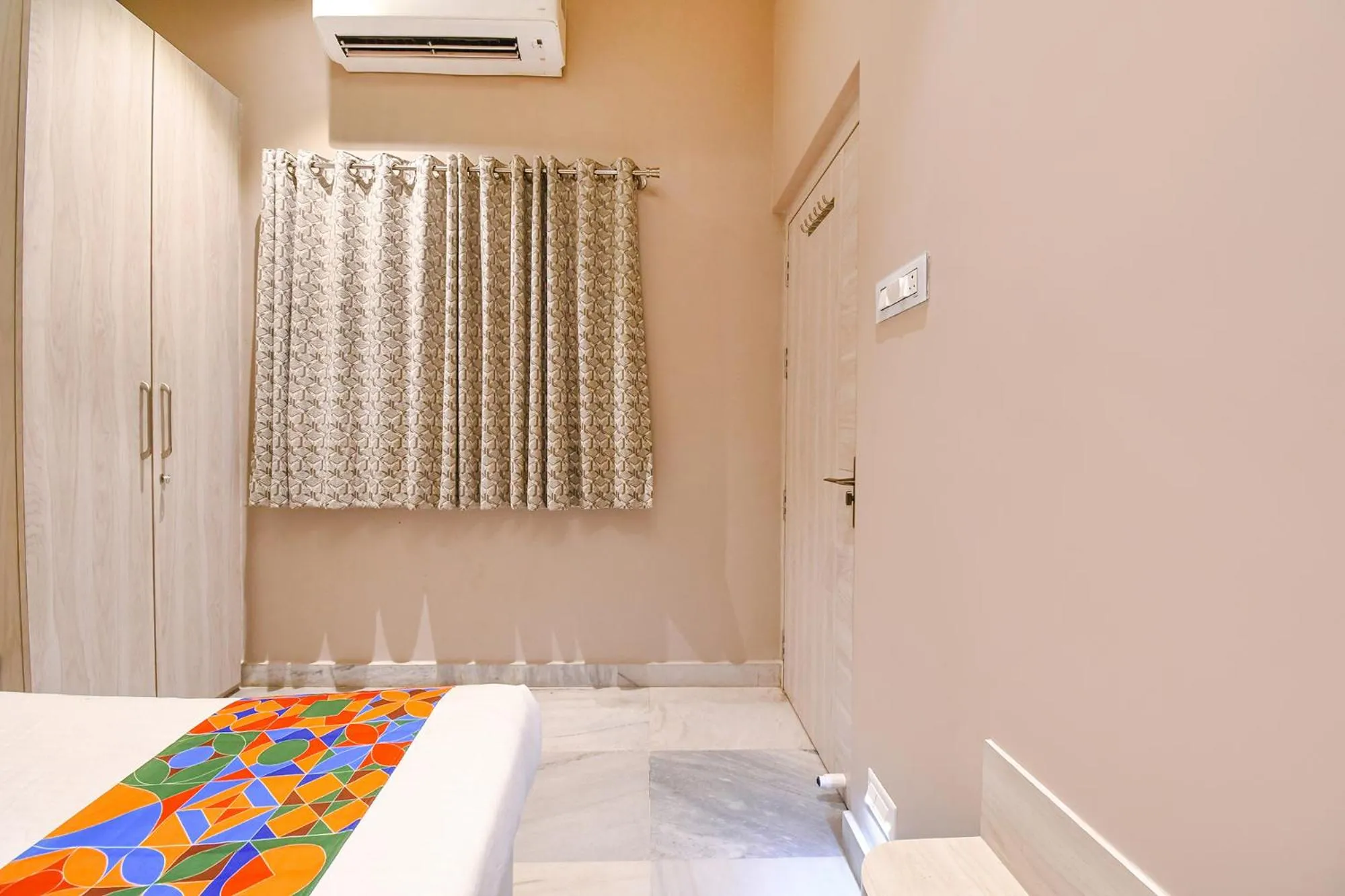 Bed in FabHotel Kitchen Q Inn - Belaghata