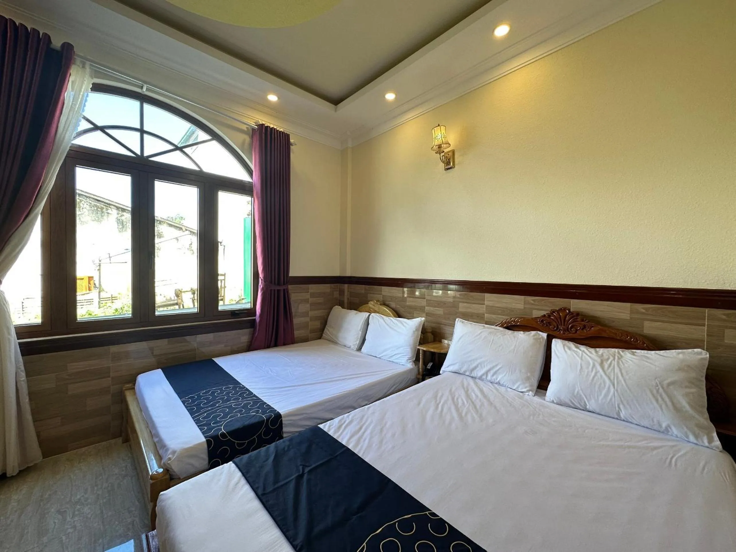 Bedroom in Capital O 1198 Dinh Loan Hotel