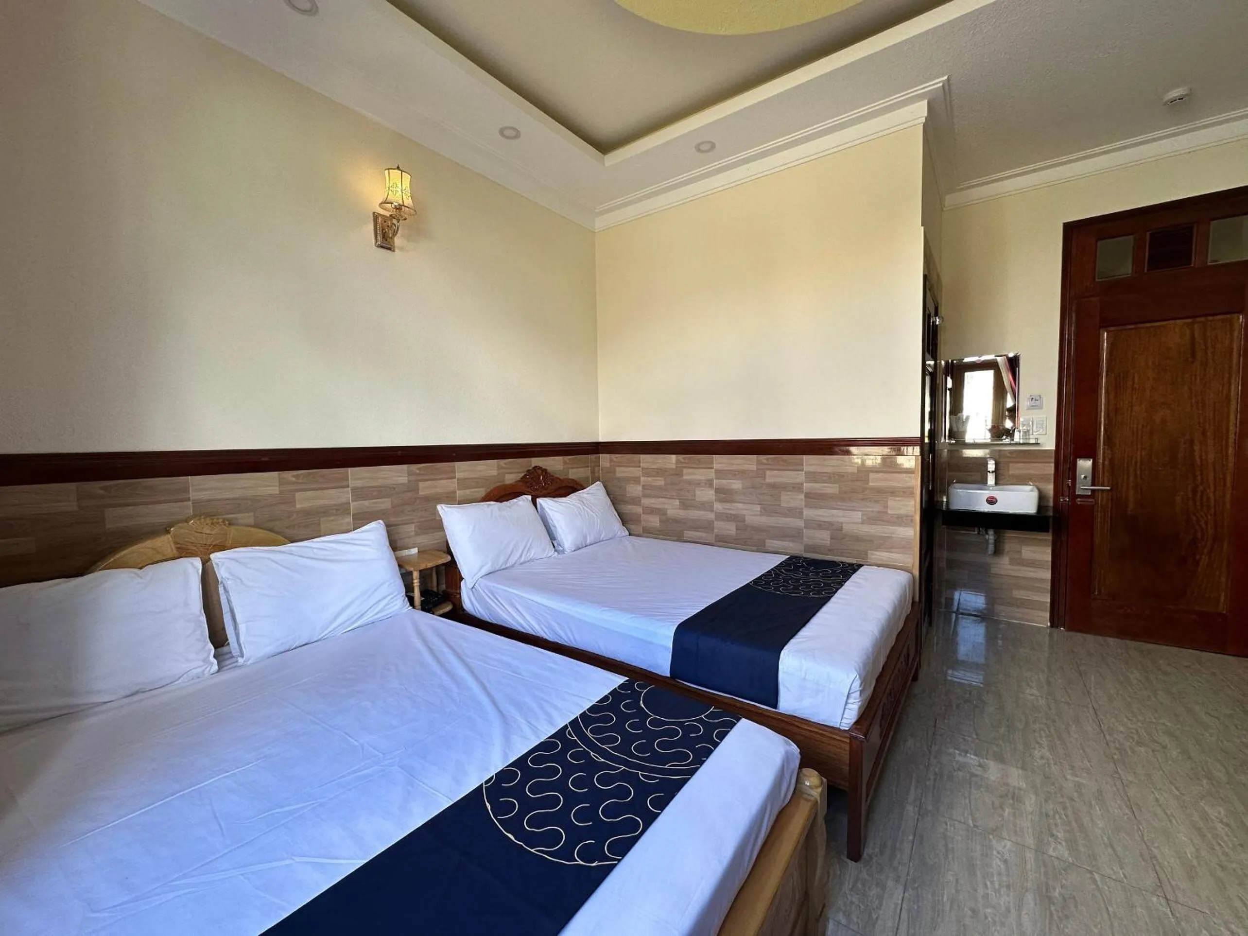 Bedroom in Capital O 1198 Dinh Loan Hotel