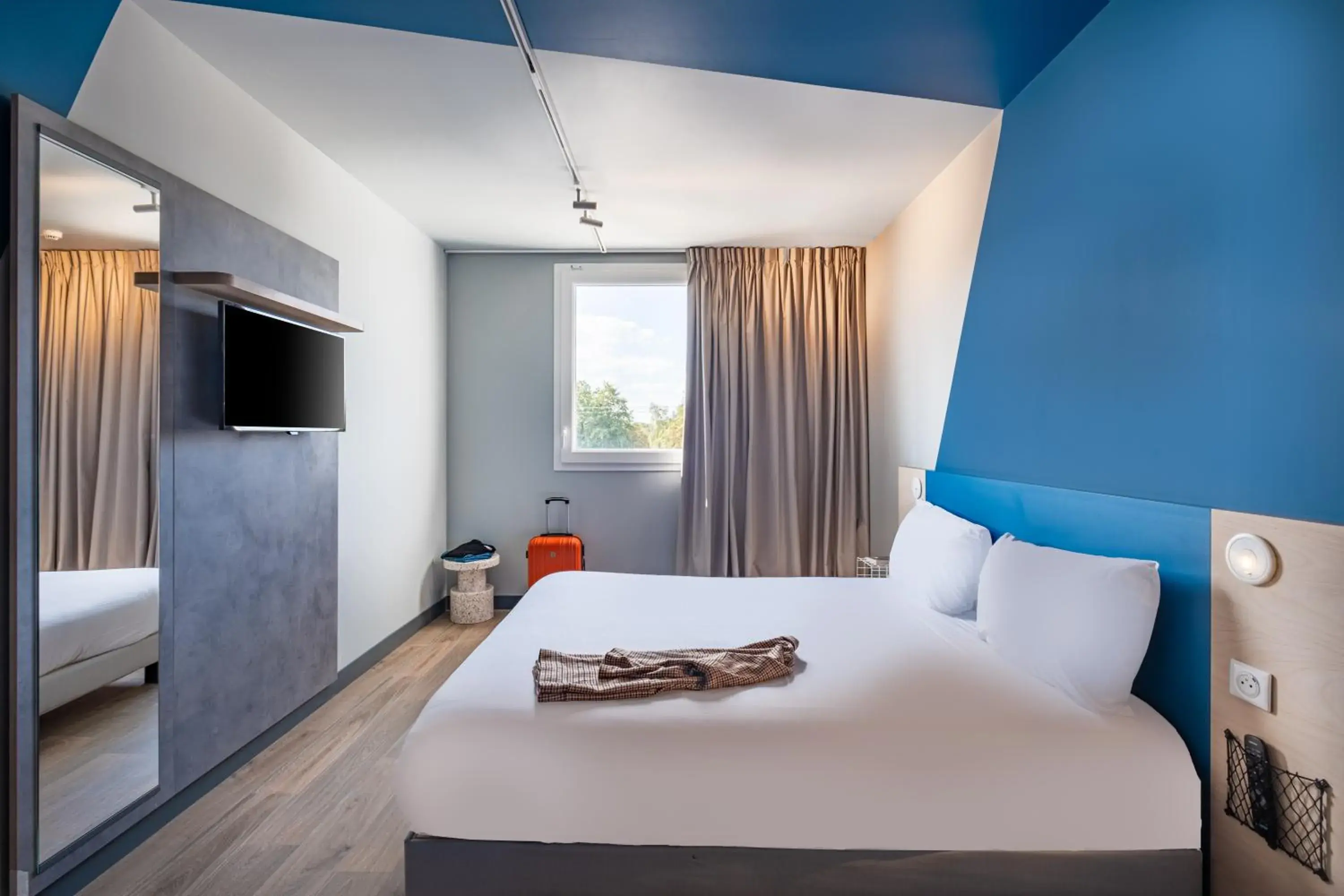 Bed in ibis budget Nantes Nord Treillières Bed in ibis budget Nantes Nord Treillières