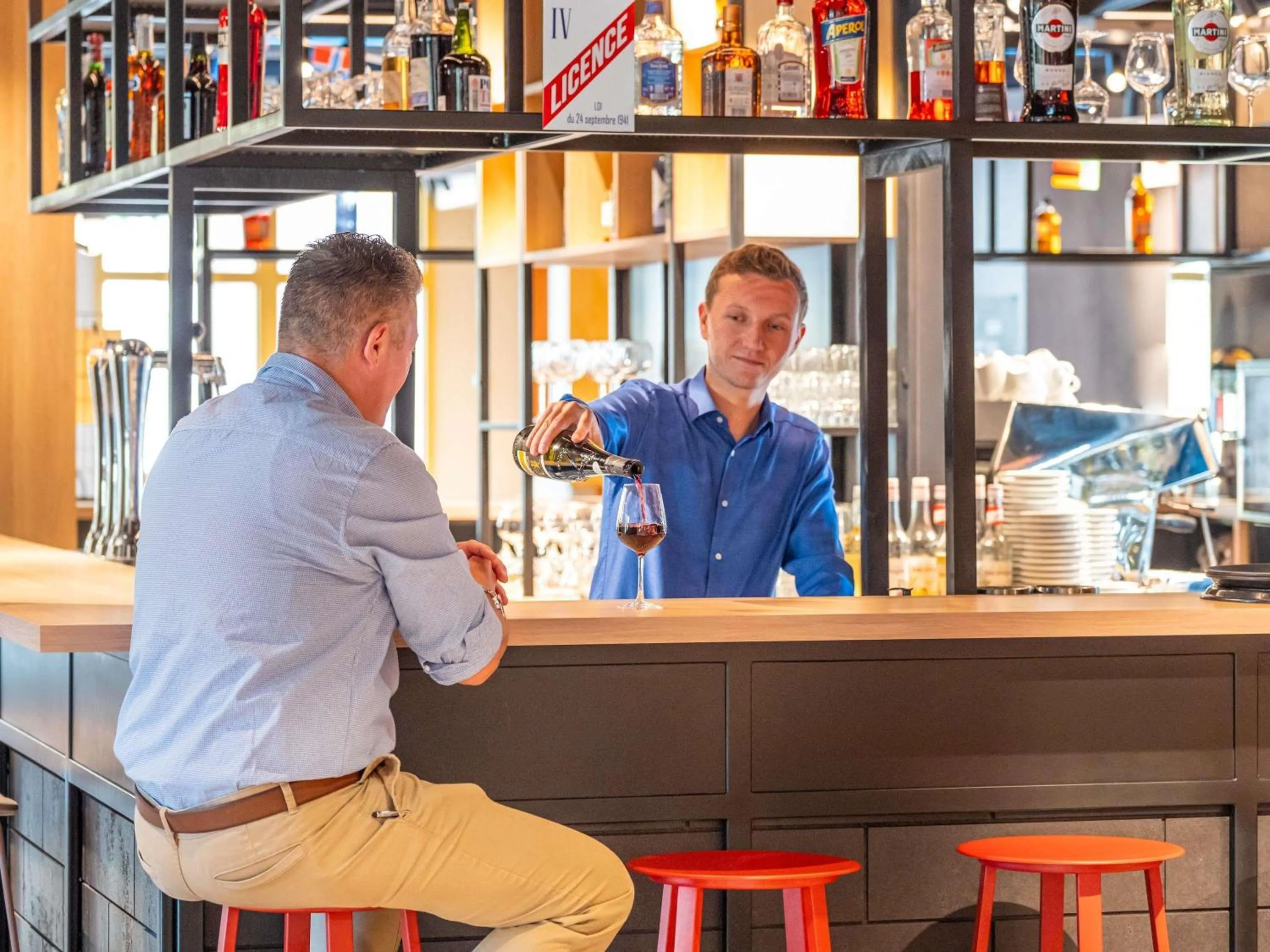 Lounge or bar in ibis budget Nantes Nord Treillières