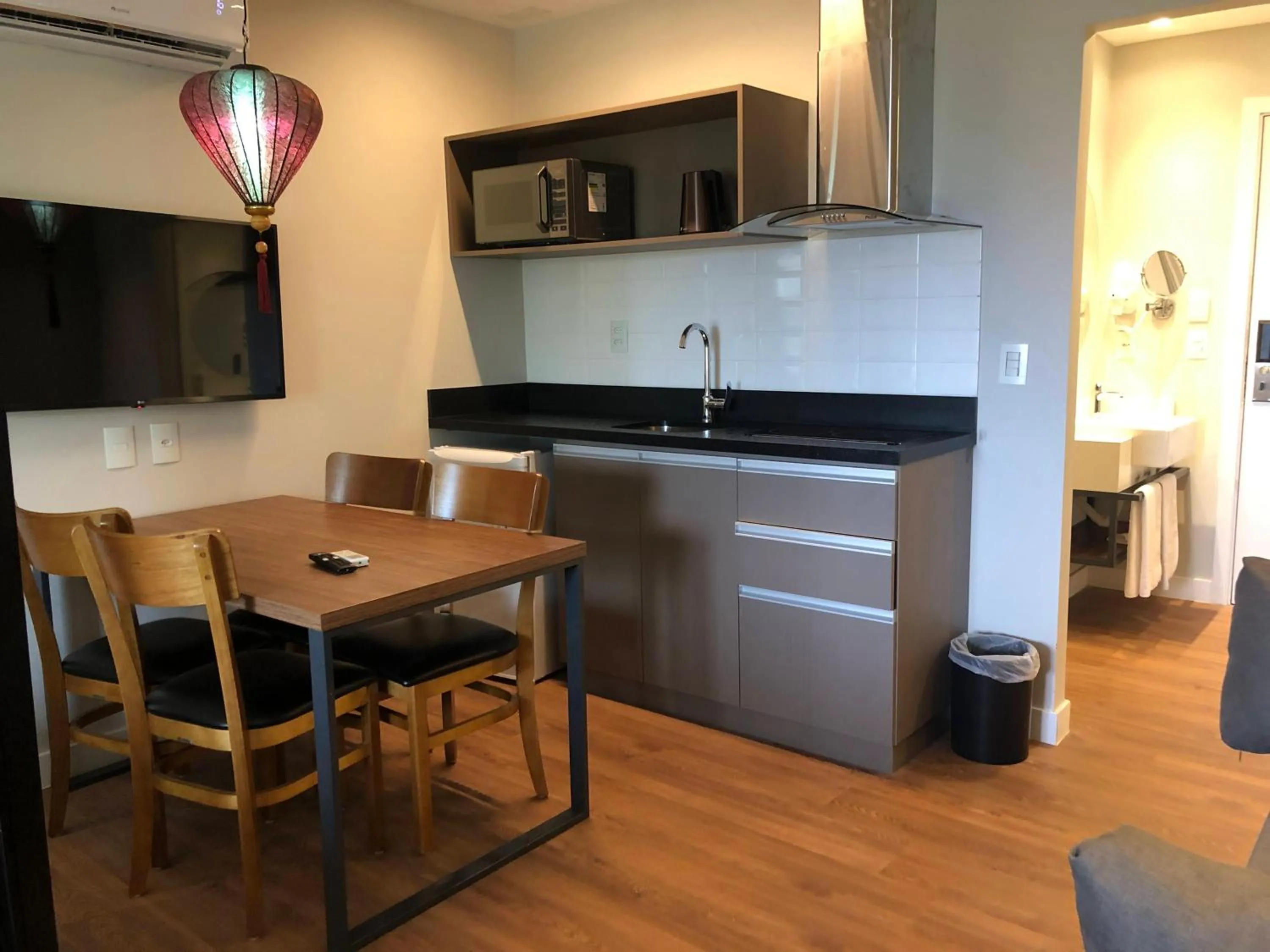 Kitchen or kitchenette in Quarto no Wanderlust Experience Hotel