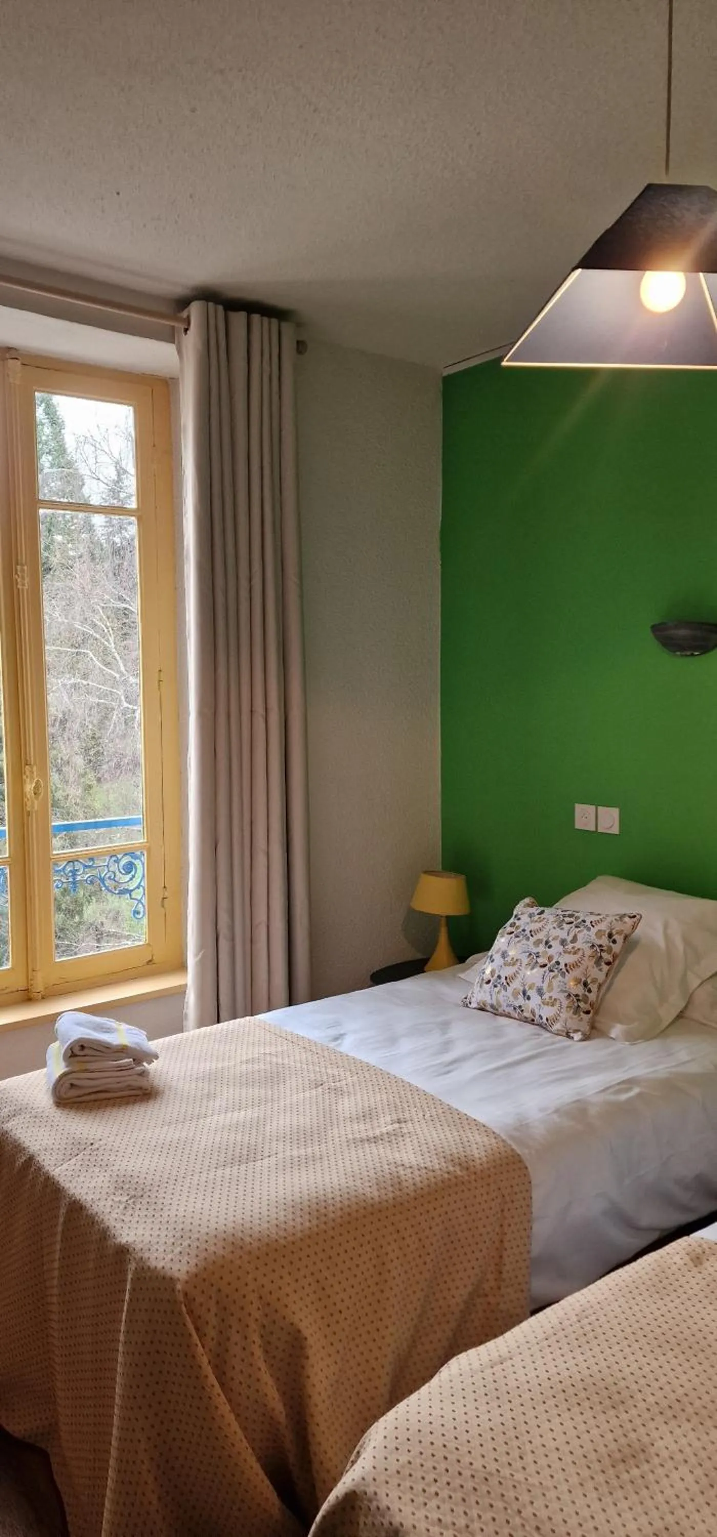 Landmark view, Bed in Hotel ChezJeanne