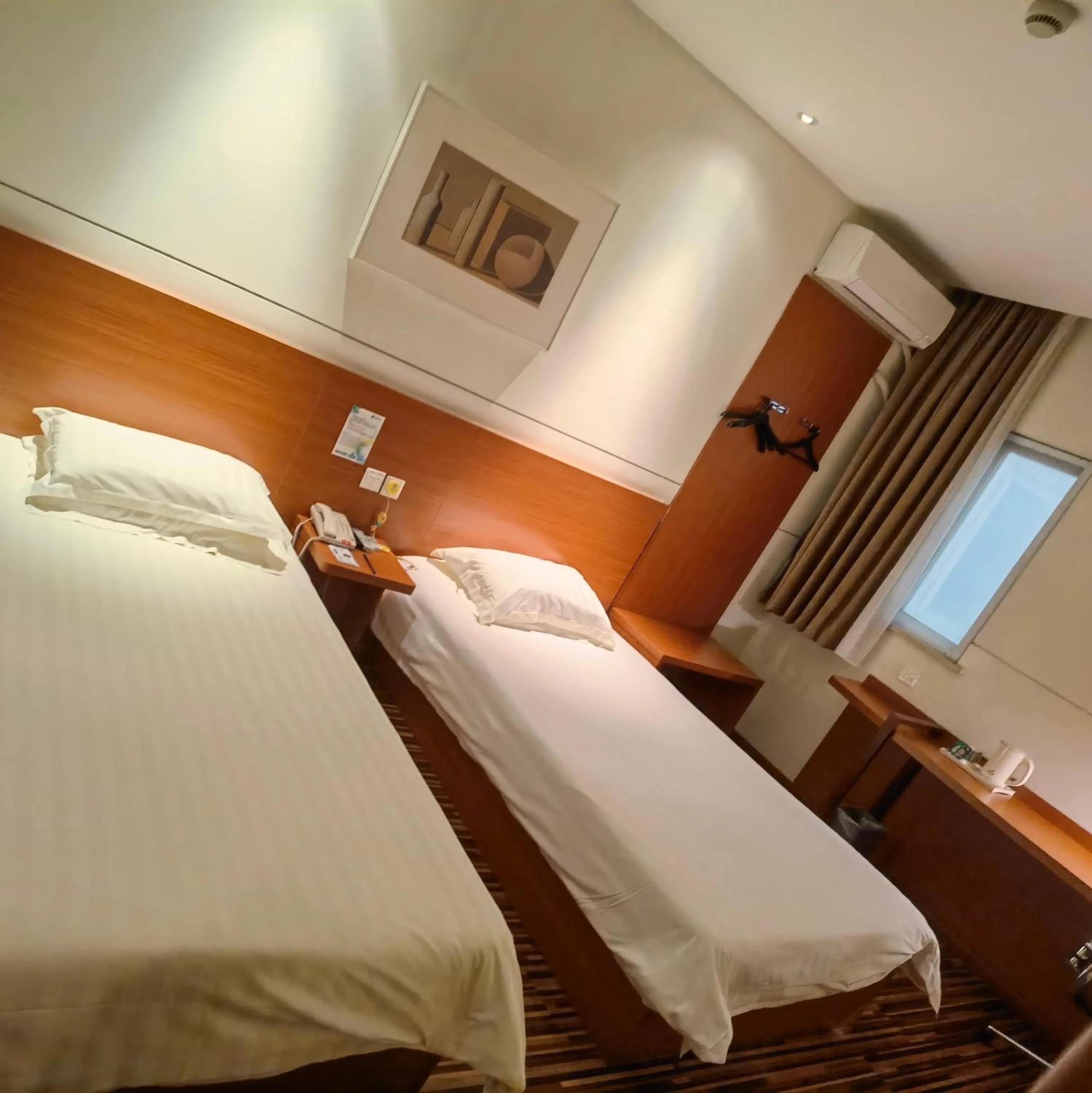 Bed in Jinjiang Inn Select Chengdu Shuangliu International Airport