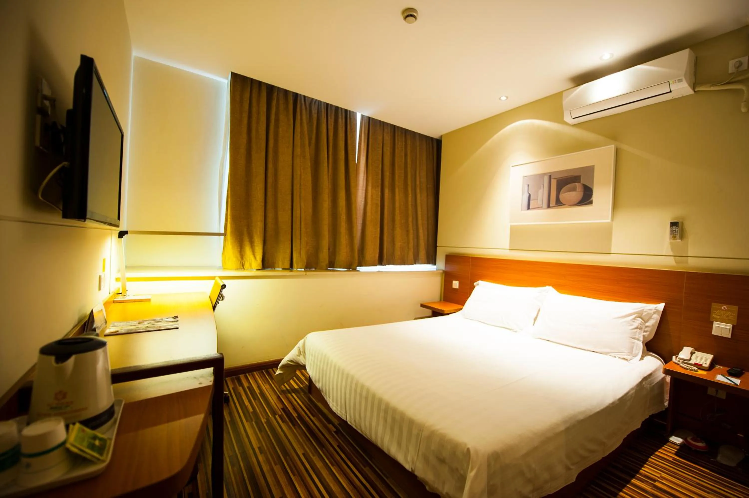 Bed in Jinjiang Inn Select Chengdu Shuangliu International Airport