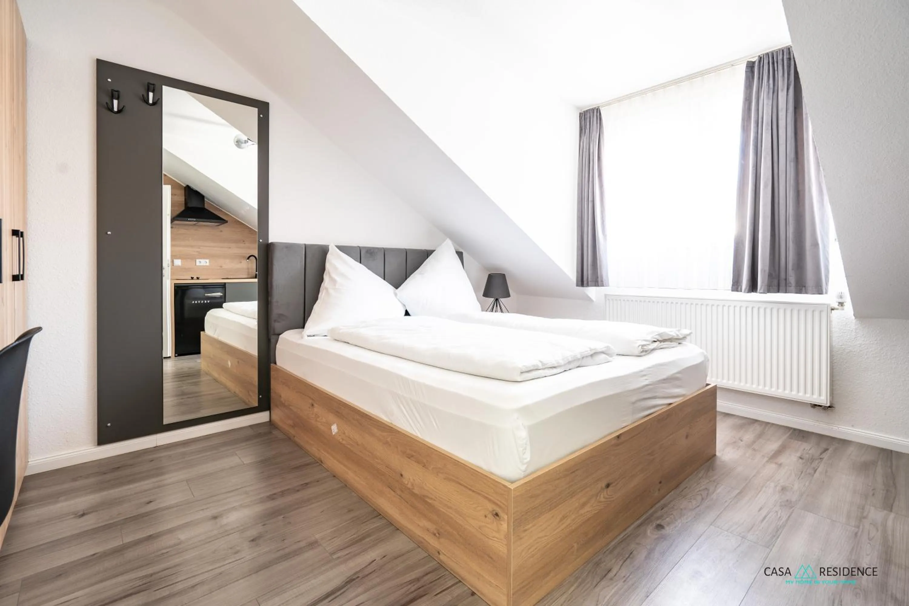 Bed in Louis Apartments