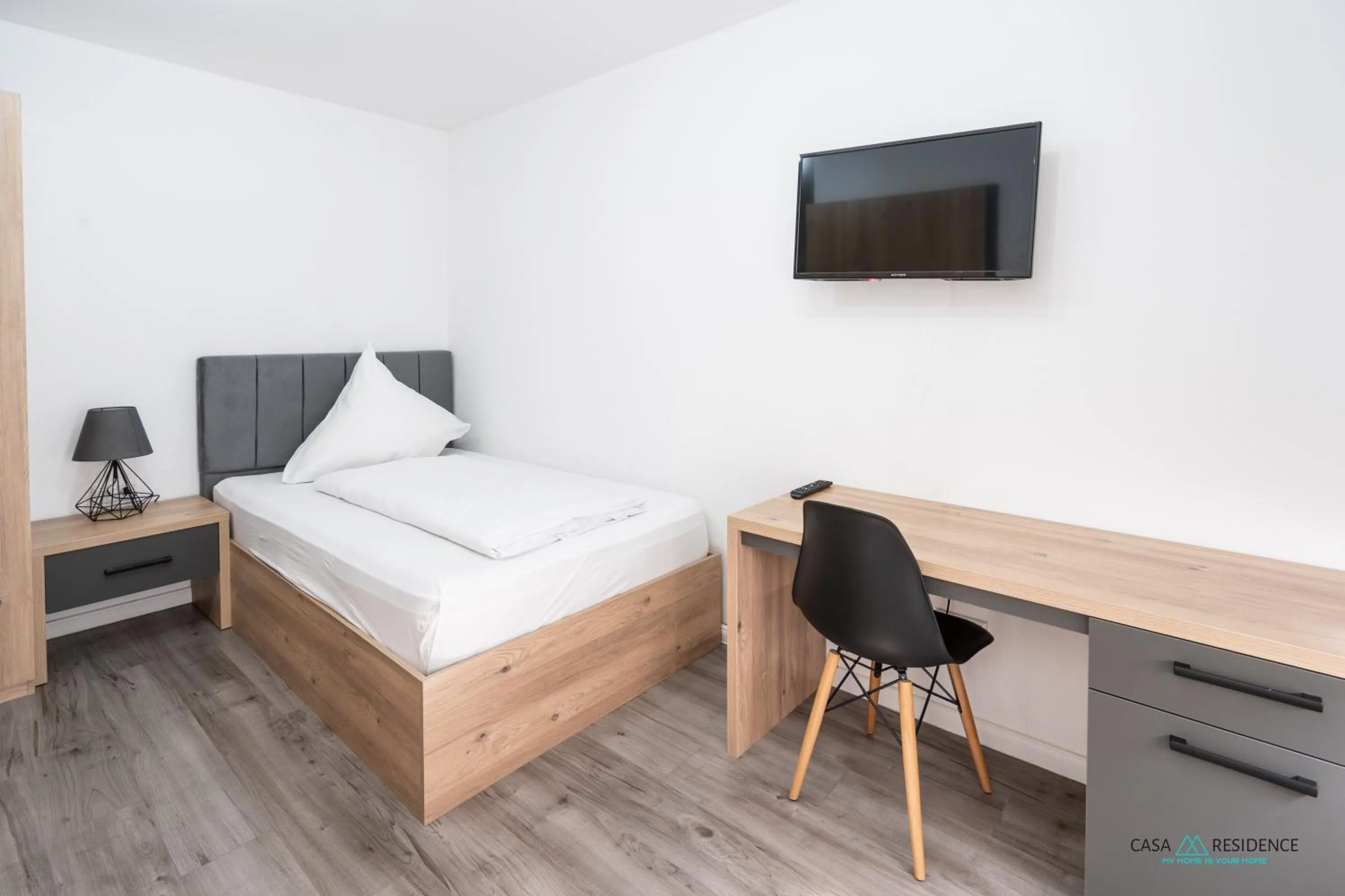 Bed in Louis Apartments